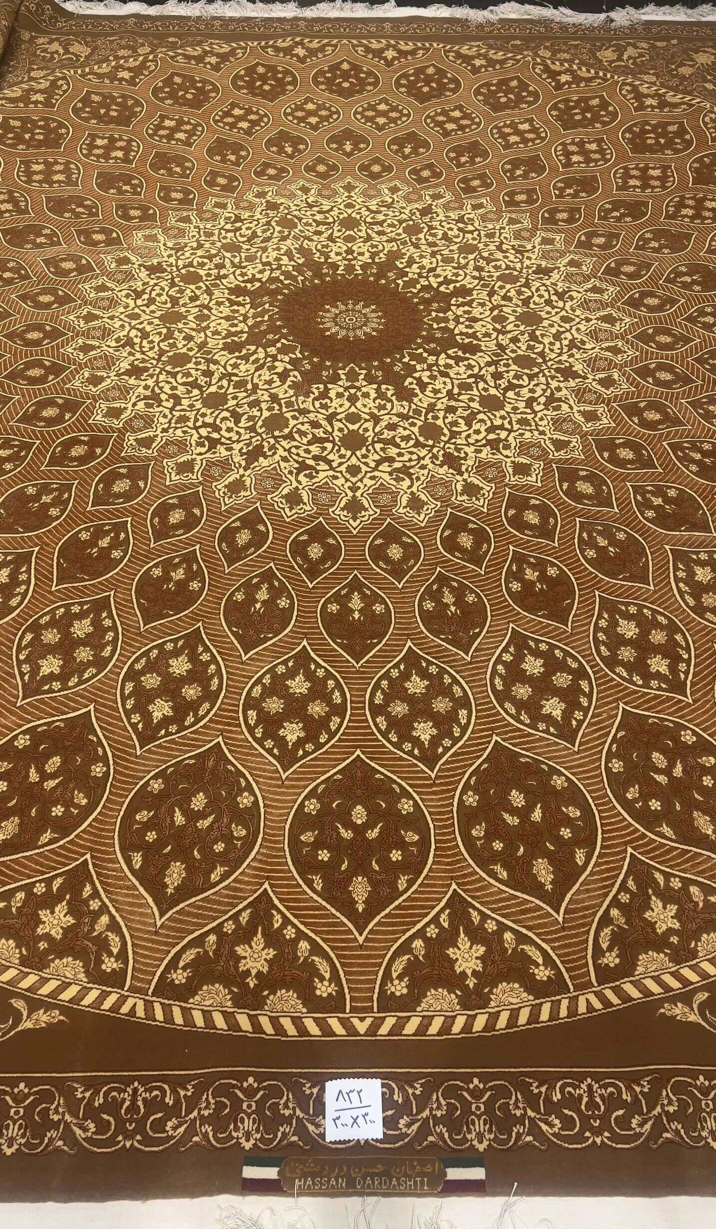"Handmade Persian dome design rug in golden and brown tones by Master Hassan Dardashtie."
