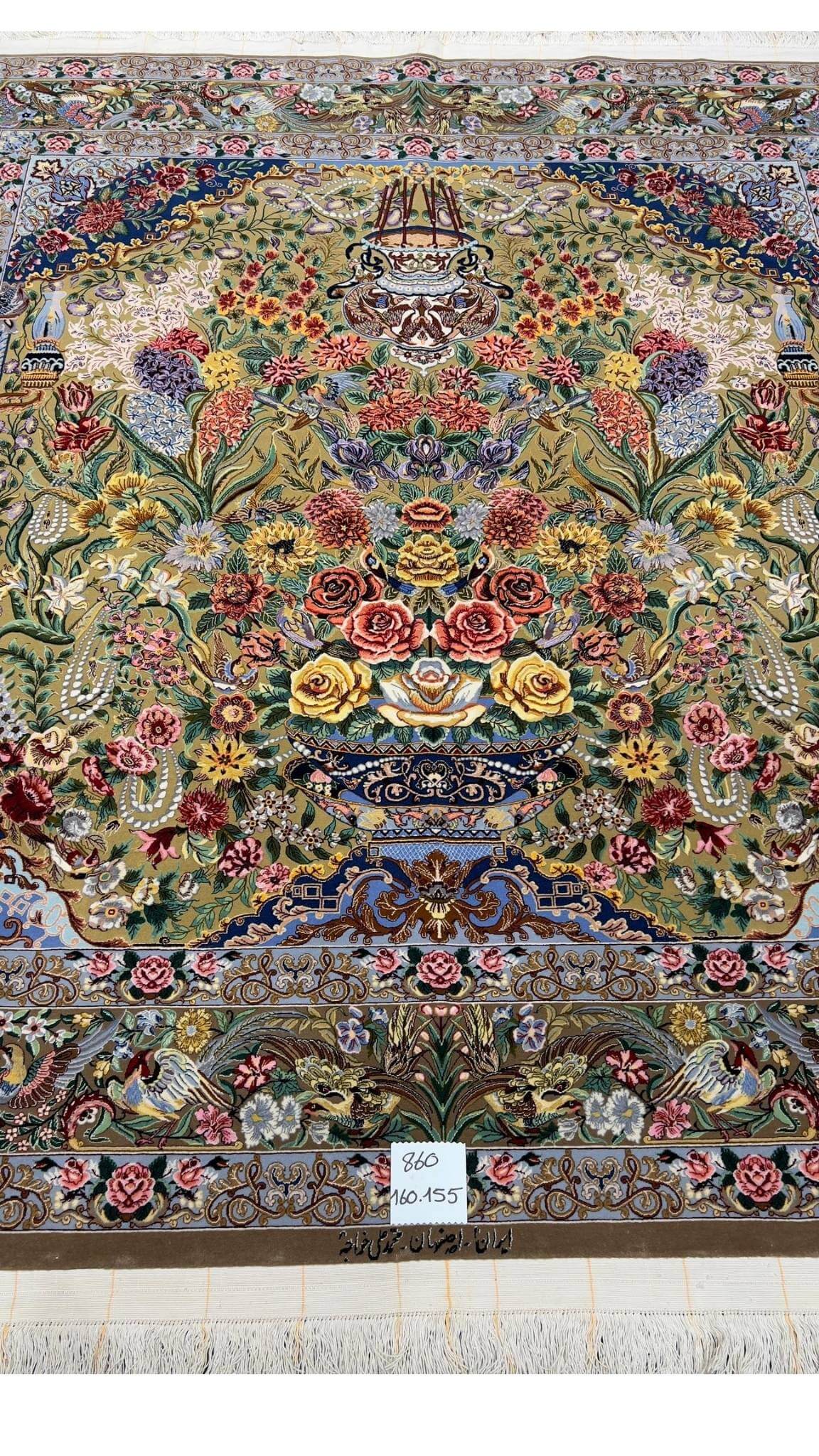 "Luxury Persian rug from Isfahan, crafted by Master Mohammad Ali Khajeh, showcasing a silk warp and wool-silk pile with intricate detailing. Dimensions: 160 x 155 cm."
