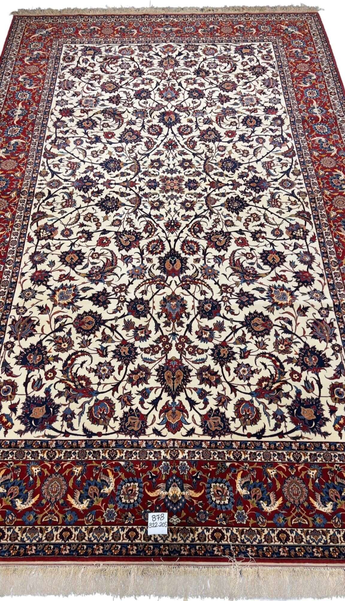 Authentic antique red and beige Persian rug from Isfahan, Iran
