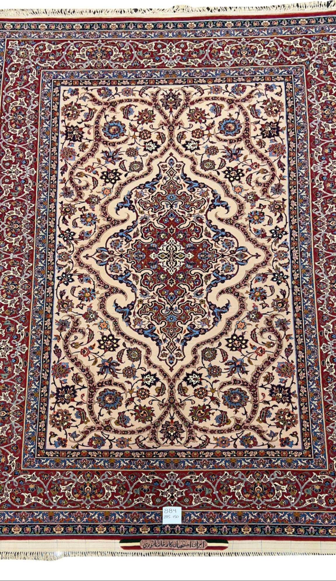 Classic antique rug featuring a sophisticated design in red, blue, and white, untouched for half a century