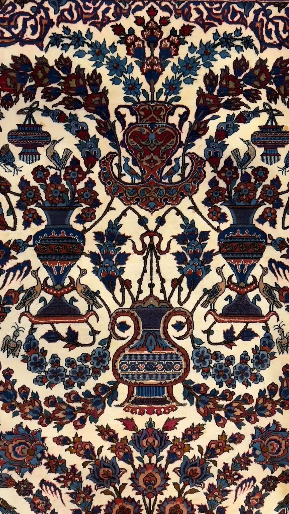 Collector's gem: a 75-year-old Persian carpet adorned with traditional floral designs