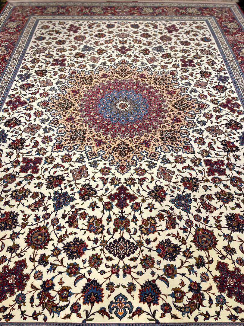 "Isfahan handmade Persian rug by Late Master Ahmad Seirafian with intricate floral medallion designs."
