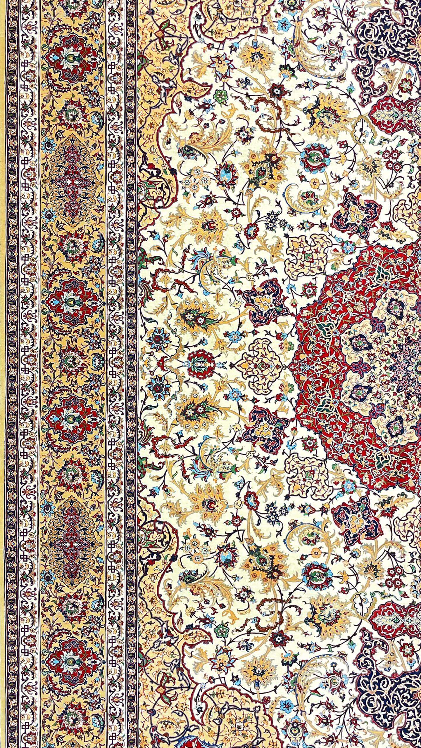 "Luxury Persian rug crafted in Isfahan, showcasing gold, cream, and burgundy tones."
