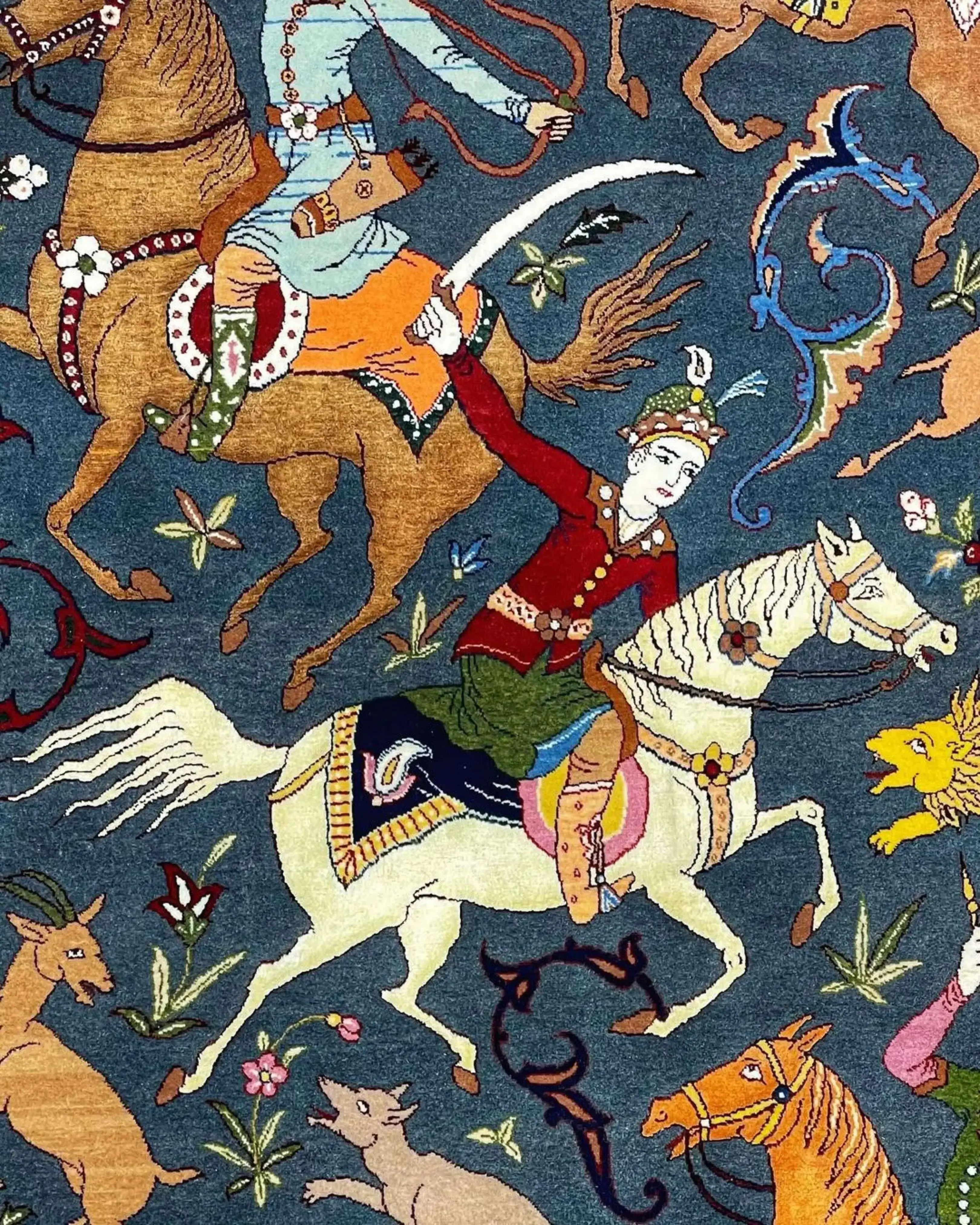 Detailed hunting scene rug with horsemen and wildlife, crafted in Isfahan.
