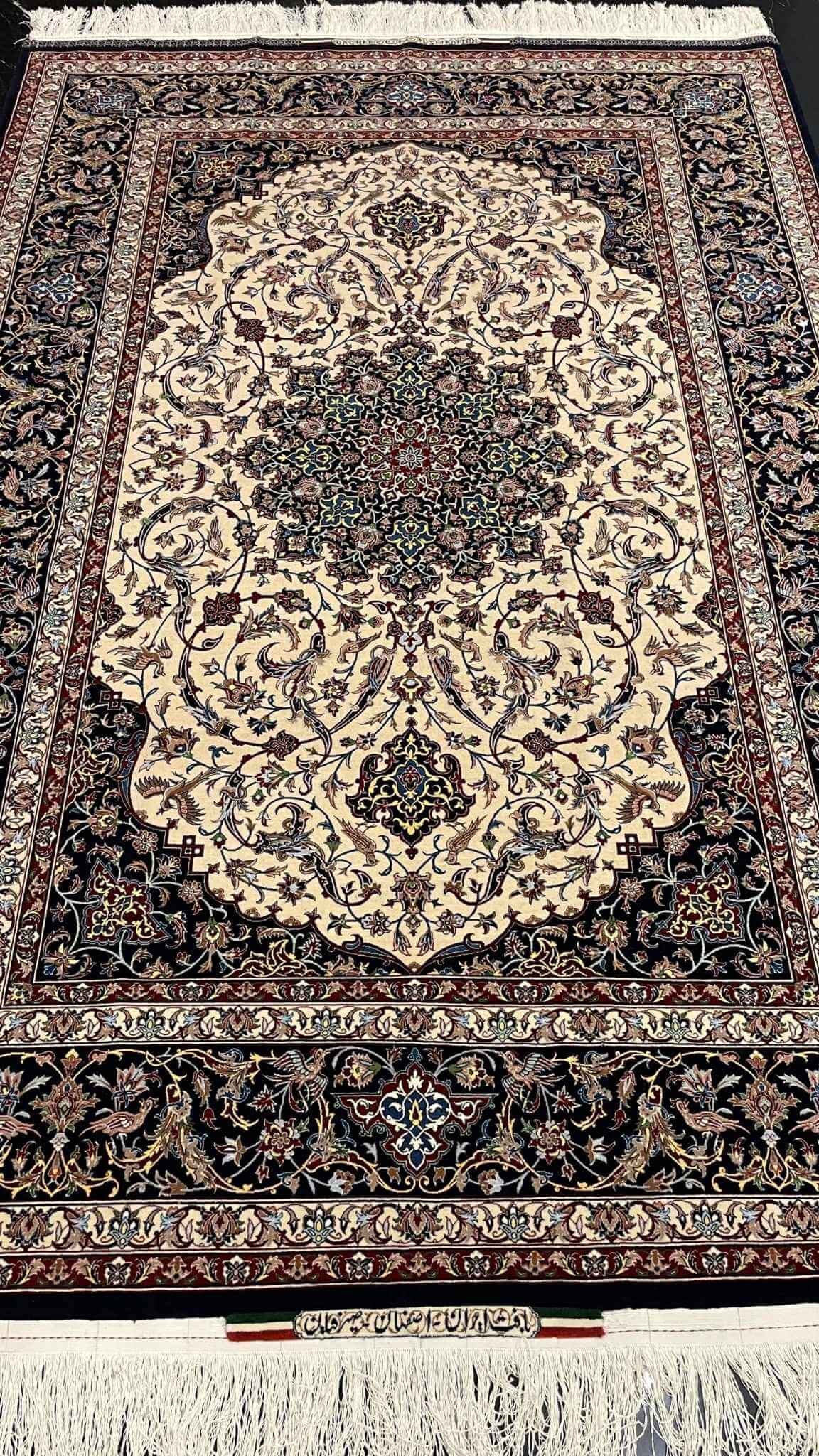 Luxury Persian carpet from Isfahan, showcasing intricate craftsmanship with natural dyed silk and wool.
