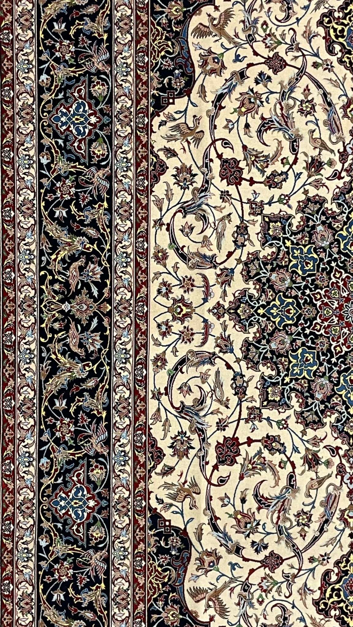 Handcrafted Isfahan carpet with a blend of natural dyes, showcasing timeless Persian artistry.
