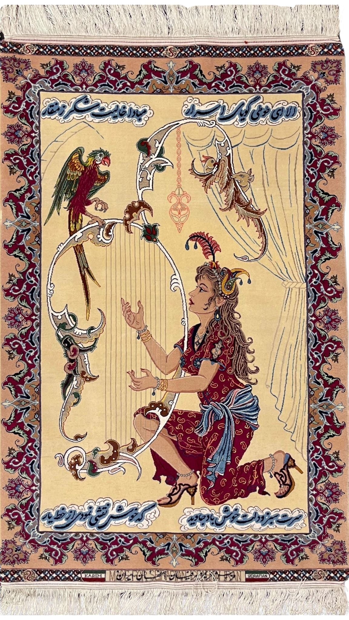 Hand-knotted Seirafian rug by Master Karim Seirafian, featuring an elegant harp-playing maiden with intricate bird and floral motifs on a beige background.
