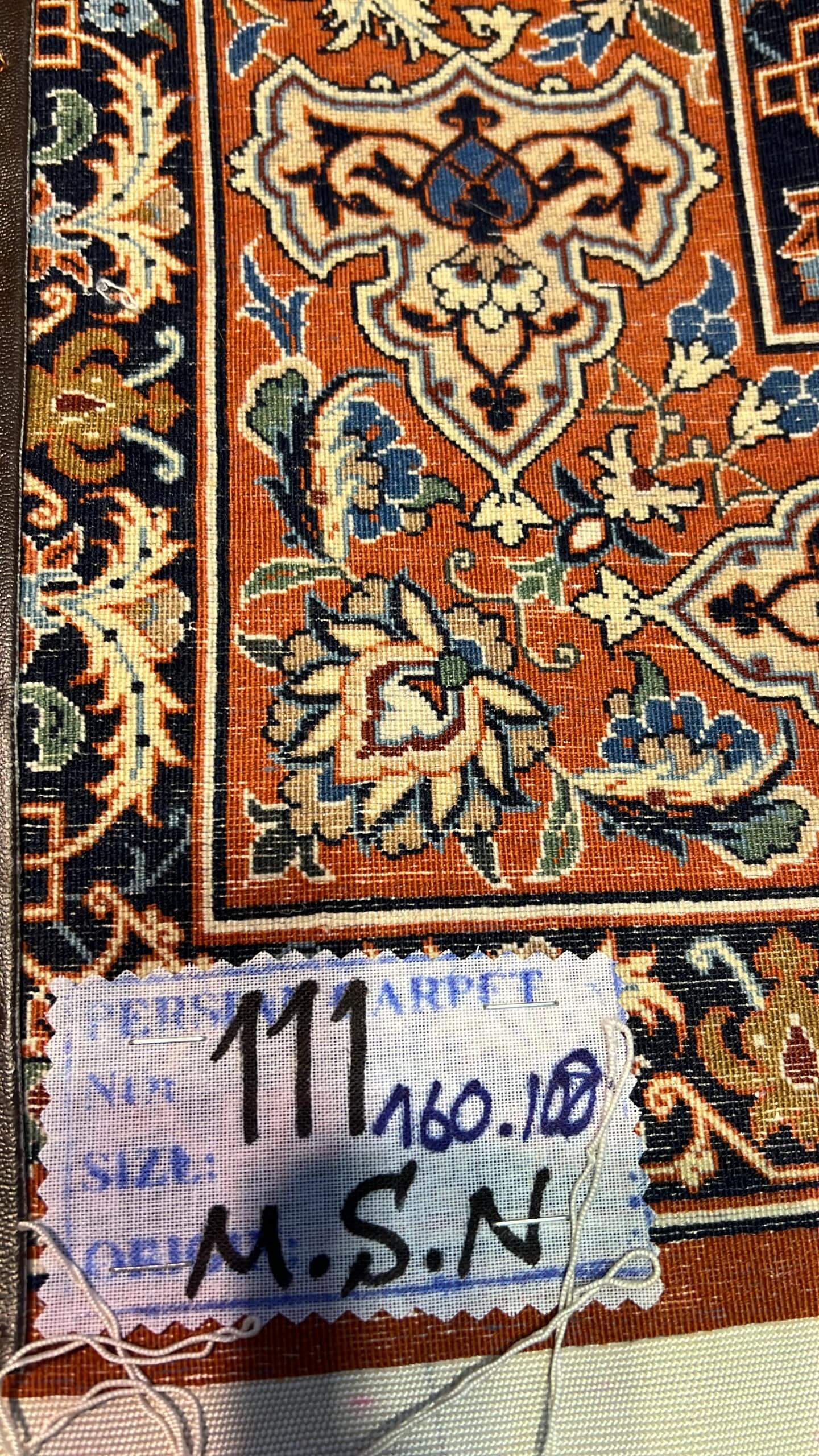 "Backside of a Master Bagher Seirafian hand-knotted Persian carpet, displaying fine craftsmanship with high knot density, silk warp, and wool pile from Isfahan."

