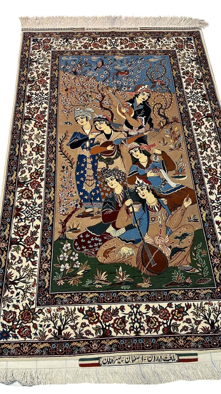 "Hand-knotted Seirafian pictorial rug by Master Bagher Seirafian, depicting Persian musicians, crafted from silk and wool in Isfahan."

