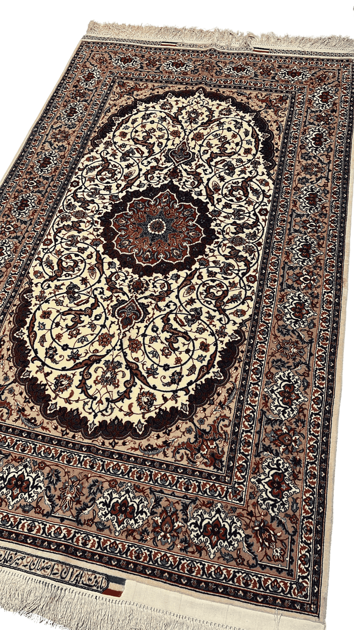"Close-up of a fine Persian silk and wool carpet with medallion design, mastercrafted by Bagher Seirafian, showing rich colors and intricate knotting."
