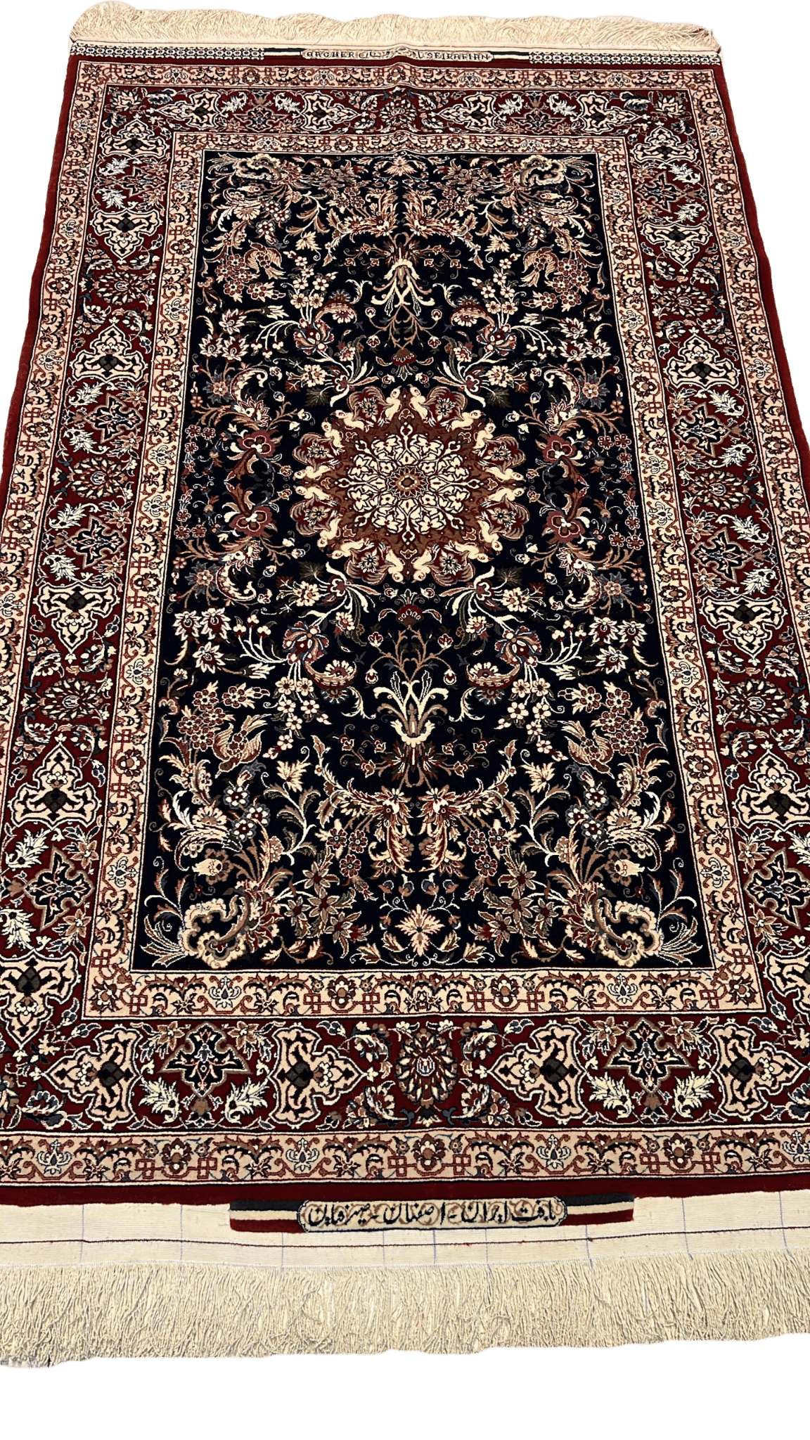 "Hand-knotted Seirafian Persian rug by Master Bagher Seirafian, featuring a classical floral design in burgundy and ivory, crafted from silk and wool in Isfahan."

