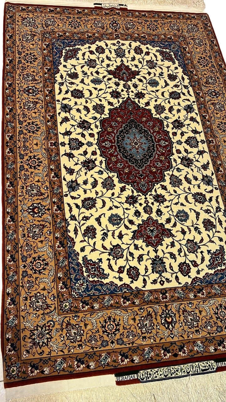 "Angled view of a hand-knotted Seirafian rug featuring floral designs and a rich medallion pattern, crafted with silk and wool by Ali Reza Seirafian."

