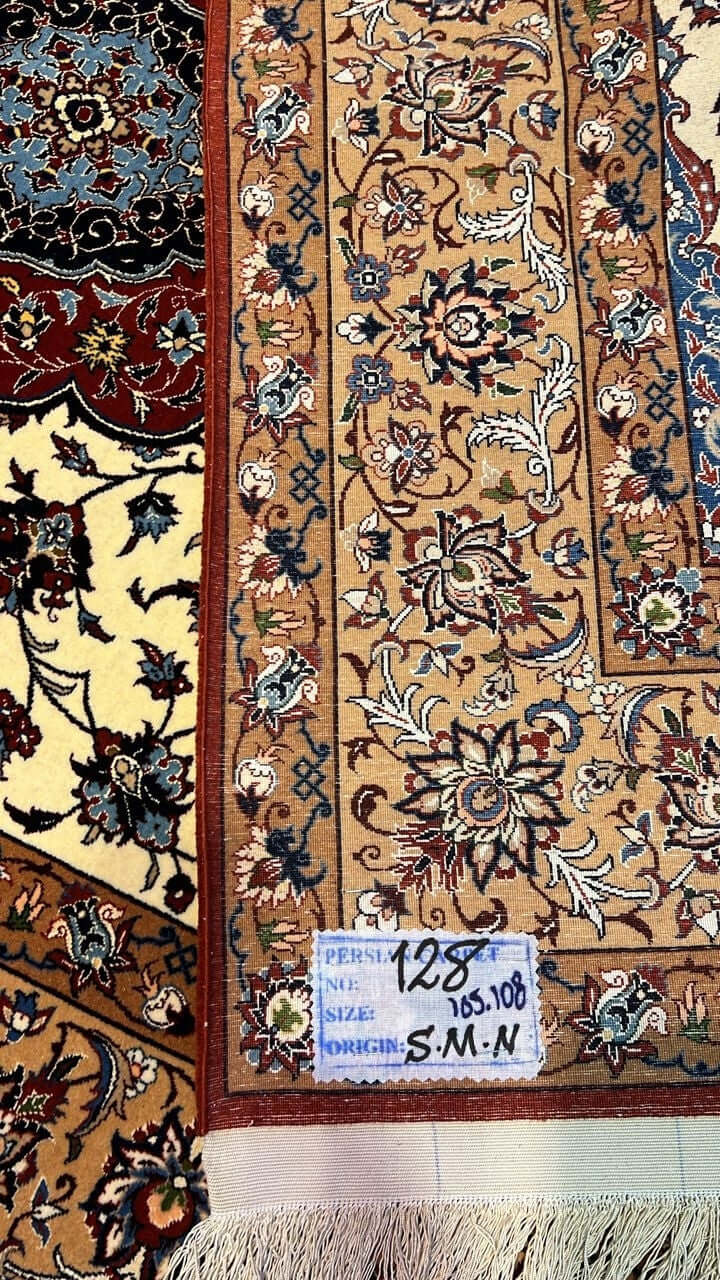 "Backside of a Seirafian Persian rug by Ali Reza Seirafian, showing the fine knotting craftsmanship and structure with silk warp and wool pile."

