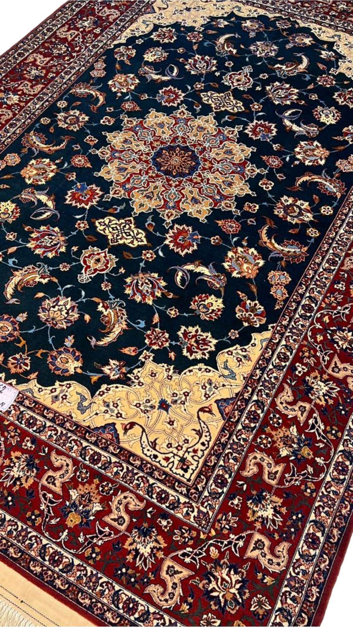 "Luxurious 50-year-old Isfahan rug in excellent condition, crafted by Master Ahmad Seirafian."
