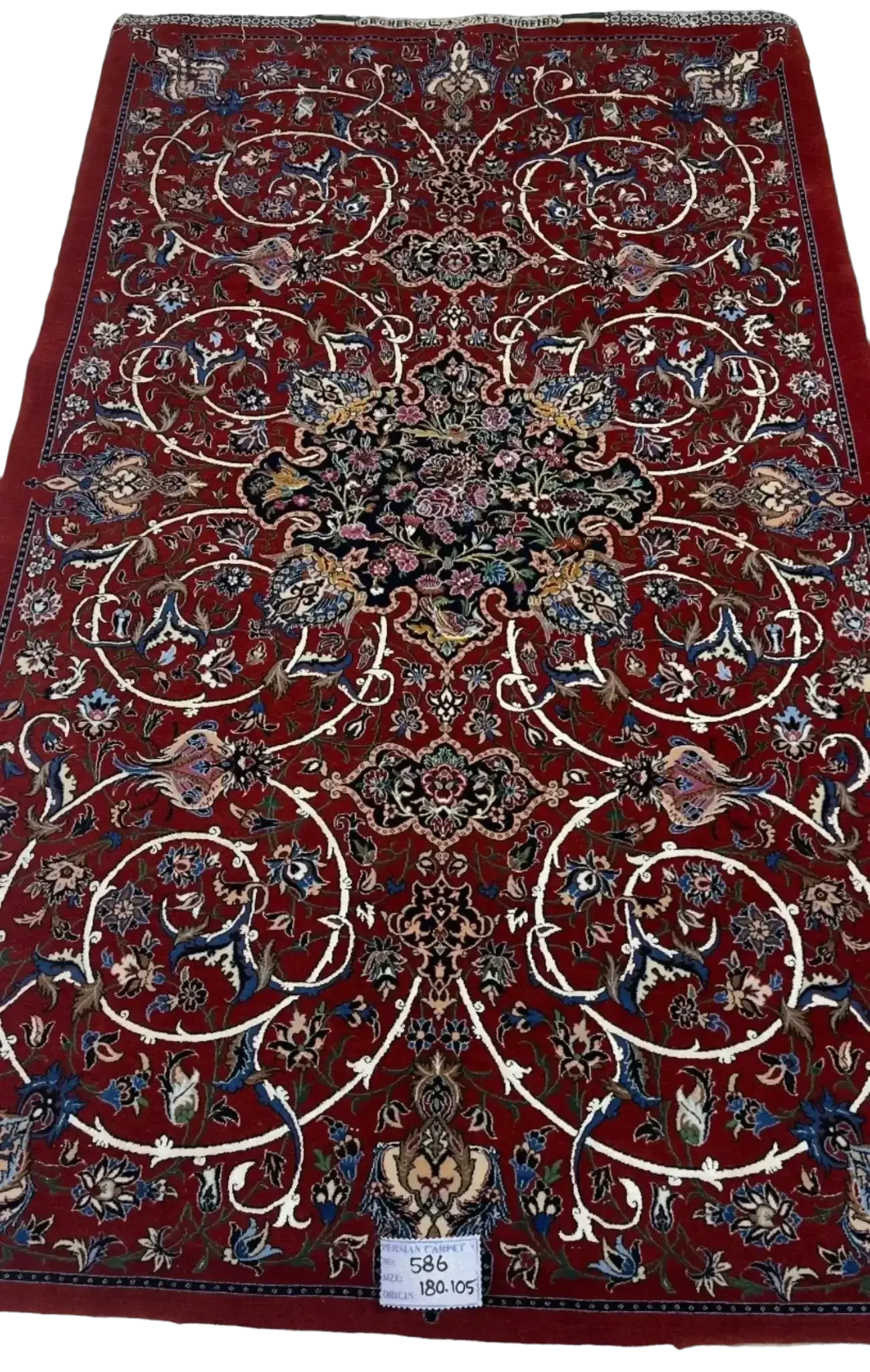  "Exquisite Isfahan Persian rug by master weaver Bagher Seirafian. Measuring 189 x 105 cm (approximately 6.2 x 3.4 feet) with a thickness of 5 mm and a remarkable knot density of 1,210,000 knots per square meter. This handcrafted masterpiece features intricate floral designs on a deep red background, with a luxurious wool and silk pile and a silk warp. This new rug from Isfahan, Iran, weighs 5 kg and is an exclusive piece."