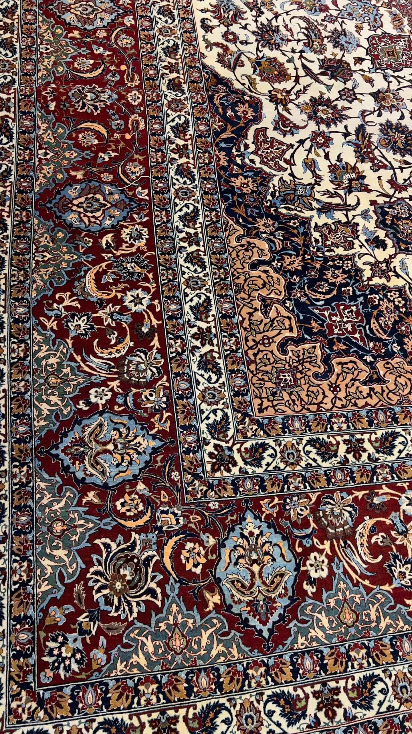 "Traditional Persian Isfahan rug by Hamid Seirafian, ideal for adding elegance to any space."
