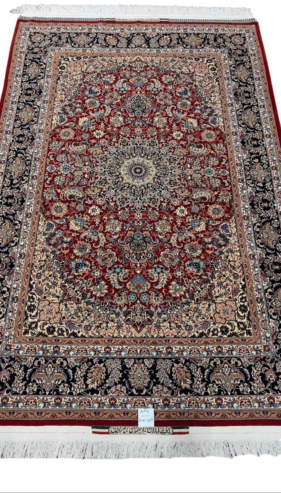 Exquisite handcrafted Seirafian Persian rug featuring a prominent medallion centerpiece