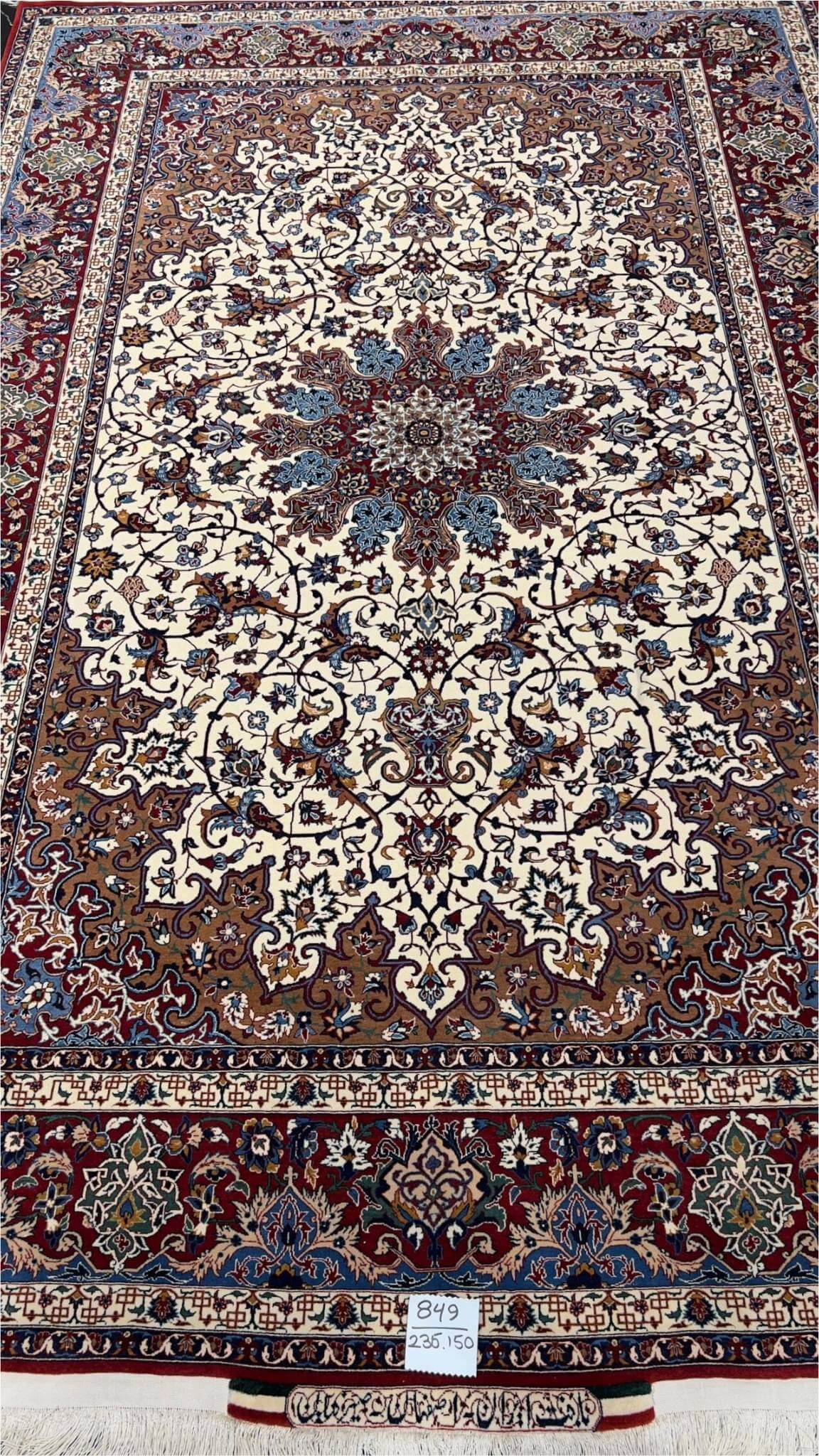 "Close-up of Ahmad Seirafian rug's knot density and craftsmanship"