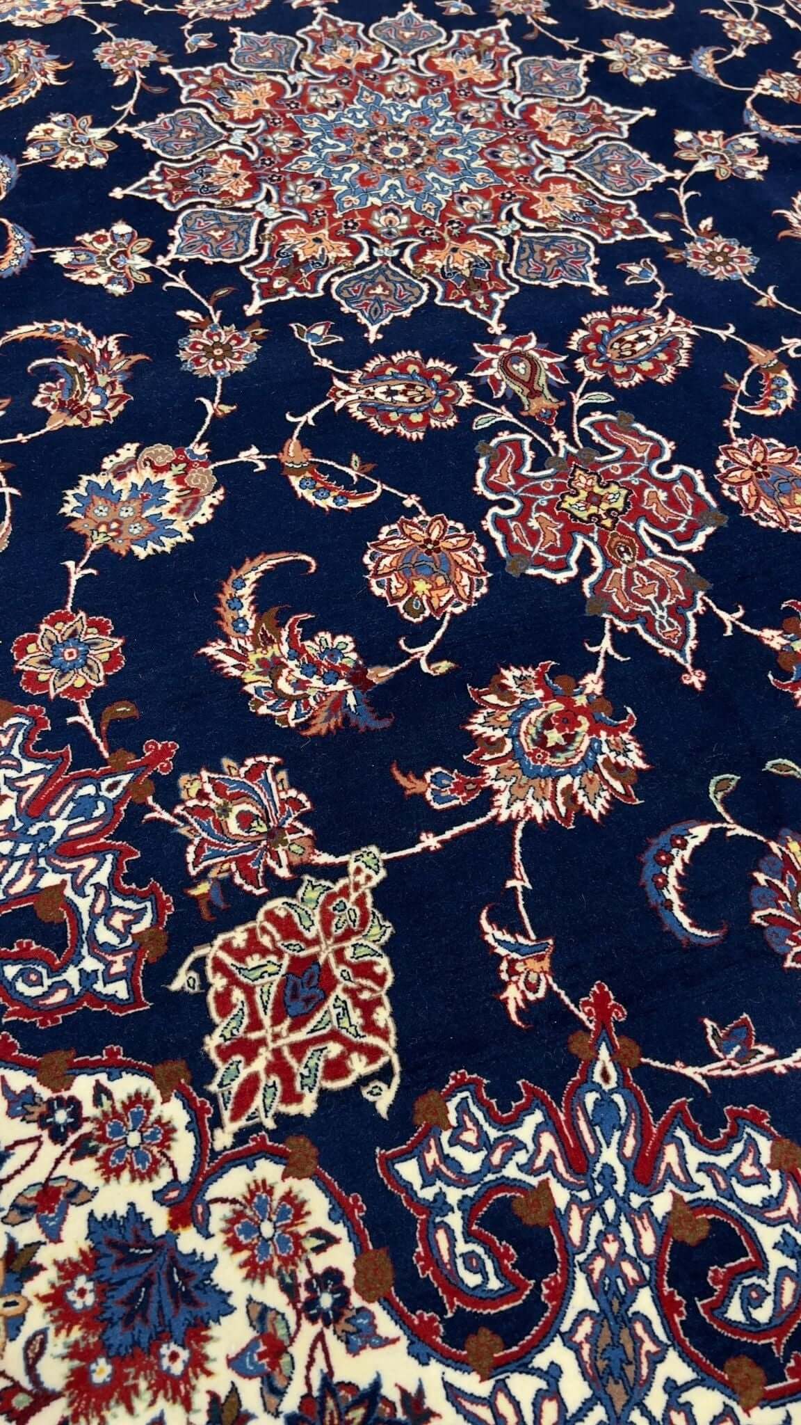 "Hand-knotted wool and silk Seirafian Persian rug showcasing intricate floral motifs."