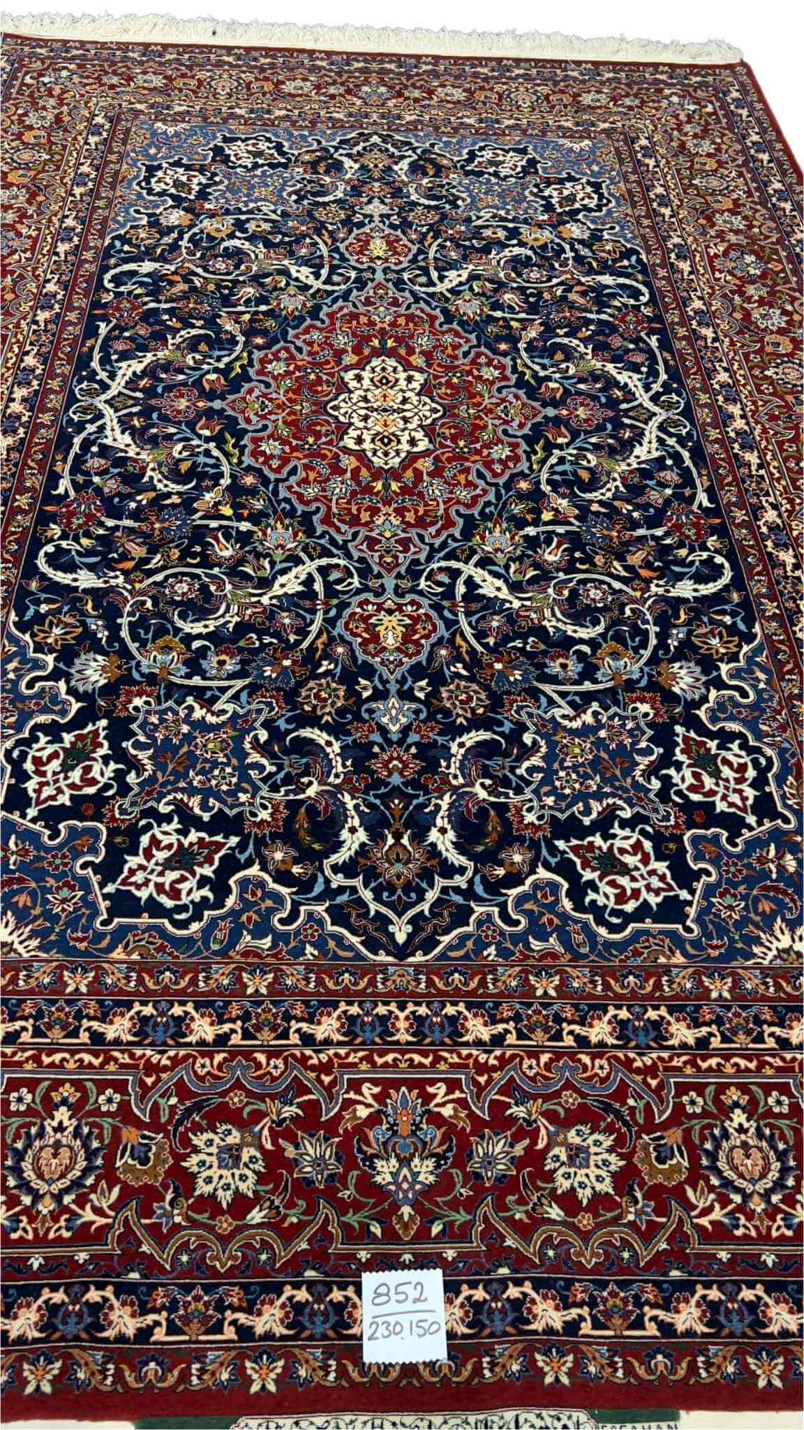 "Elegant Persian rug with a silk warp and wool-silk pile, dyed with natural colors."

