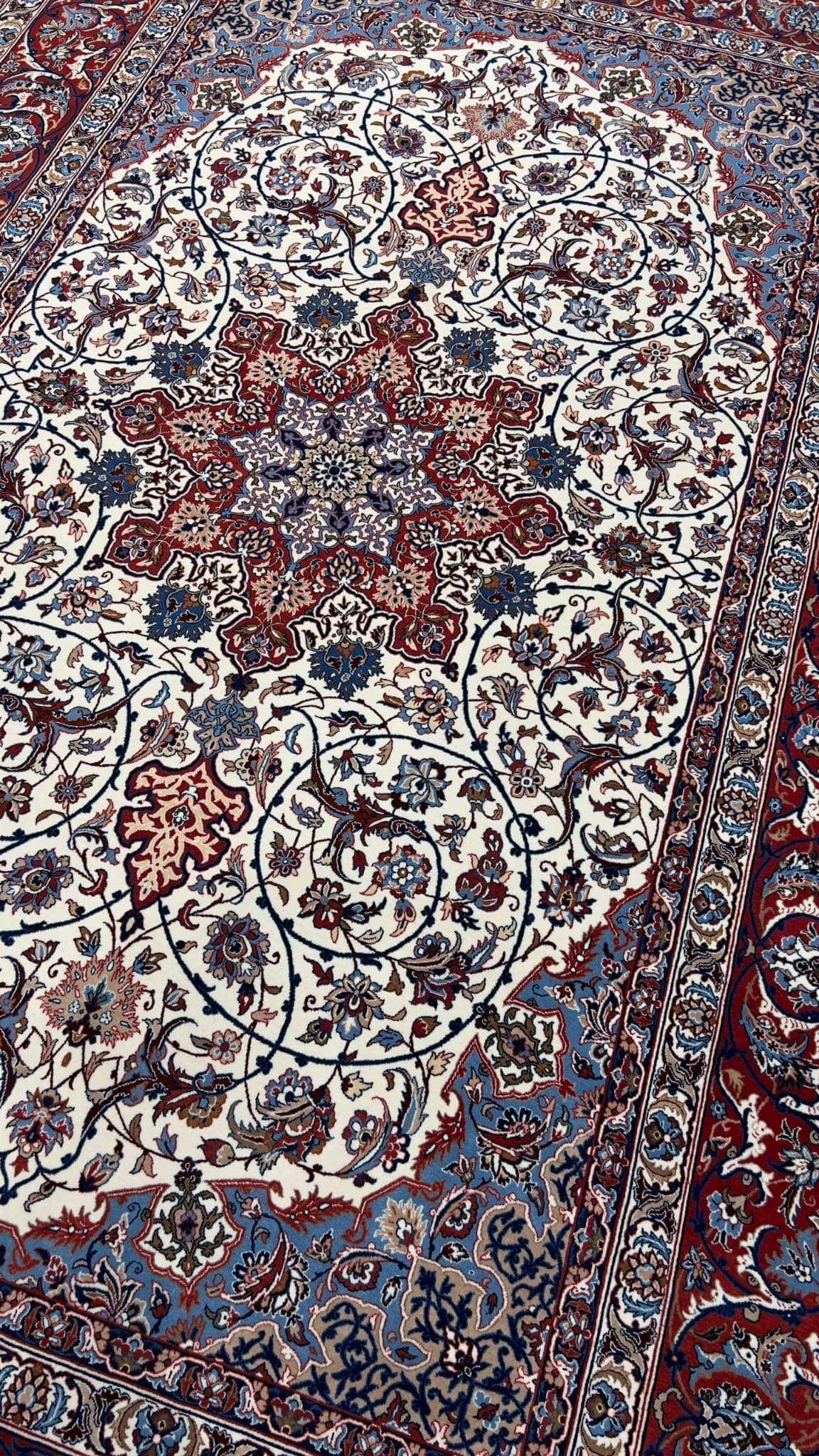 "Master Bagher Seirafian Persian rug, showcasing exceptional craftsmanship with a wool-silk blend pile."
