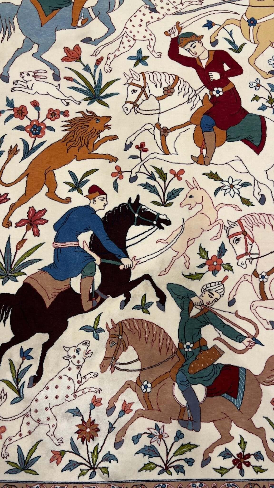 Unique handmade rug featuring the iconic Haj Mosavar hunting scene design.

