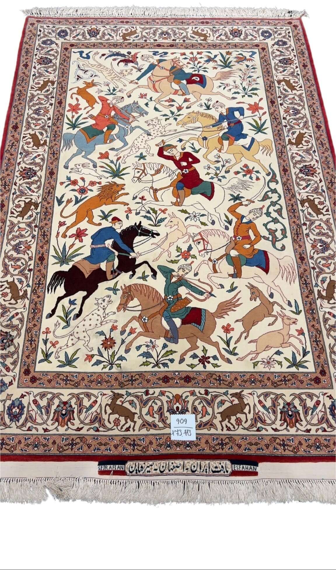 Hand-knotted Persian rug depicting a vibrant hunting scene, crafted by Ahmad Seirafian.
