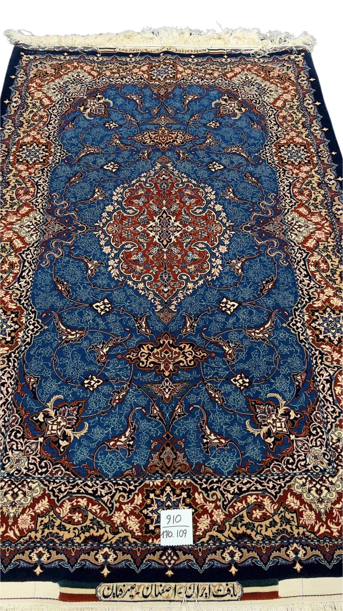 Luxurious Isfahan rug with intricate floral patterns and natural dye.
