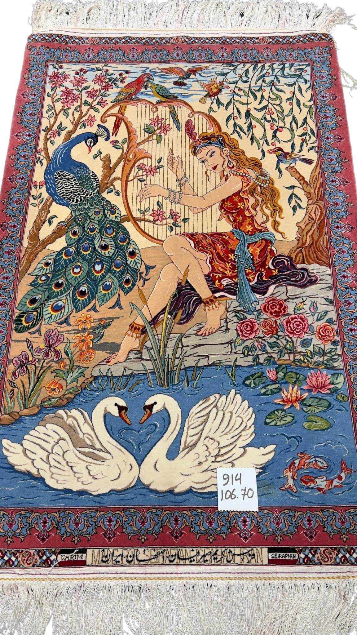 Small hand-knotted Seirafian carpet ideal for home decor or wall hanging.