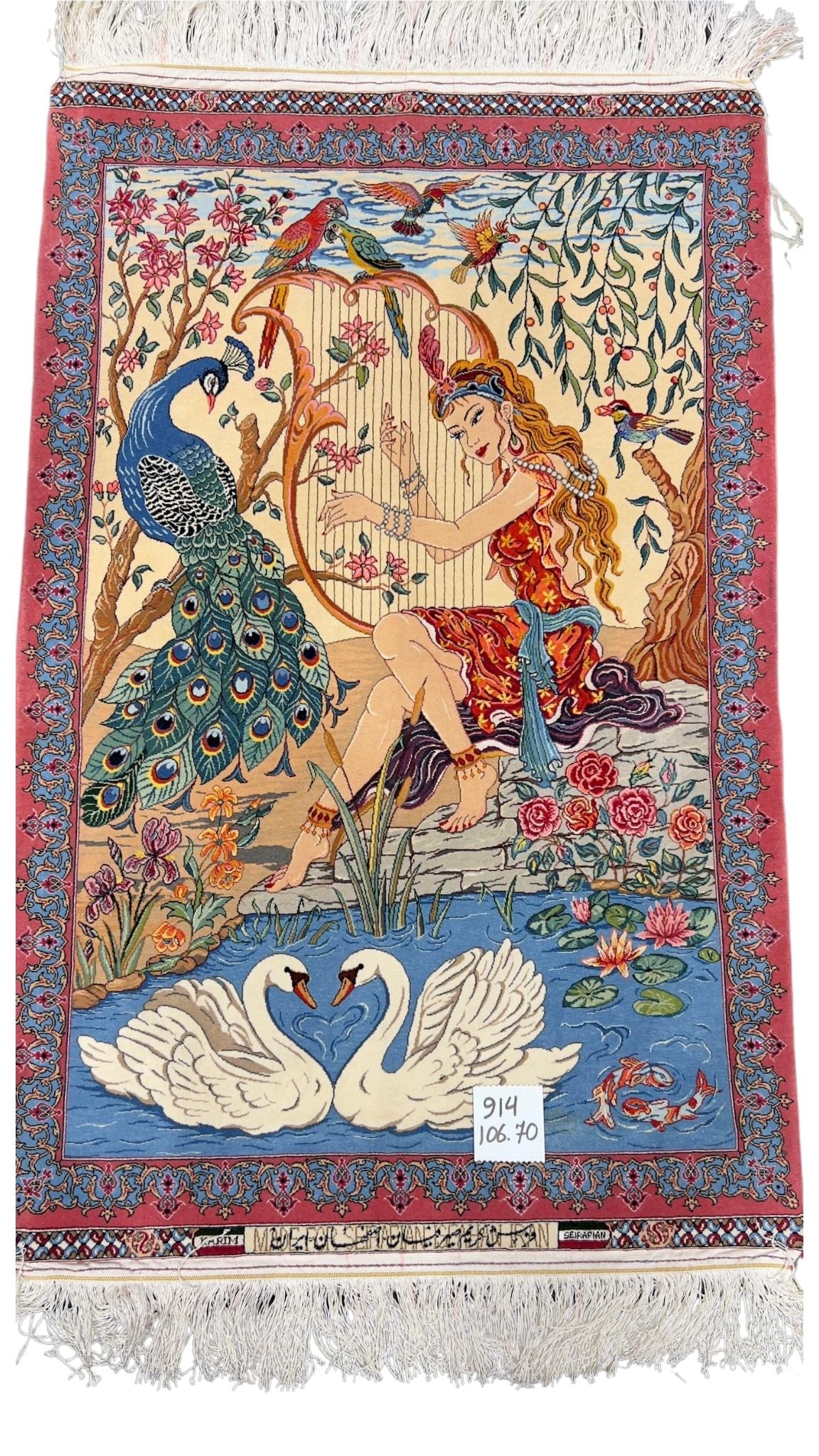 Elegant Isfahan rug with a harp-playing maiden, crafted by Master Karim Seirafian.
