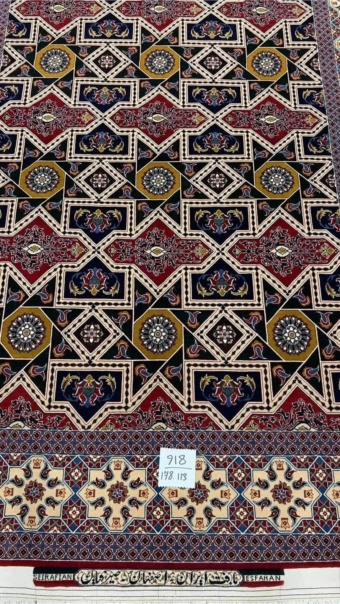 Seirafian rug with bold colors and traditional Persian design elements.
