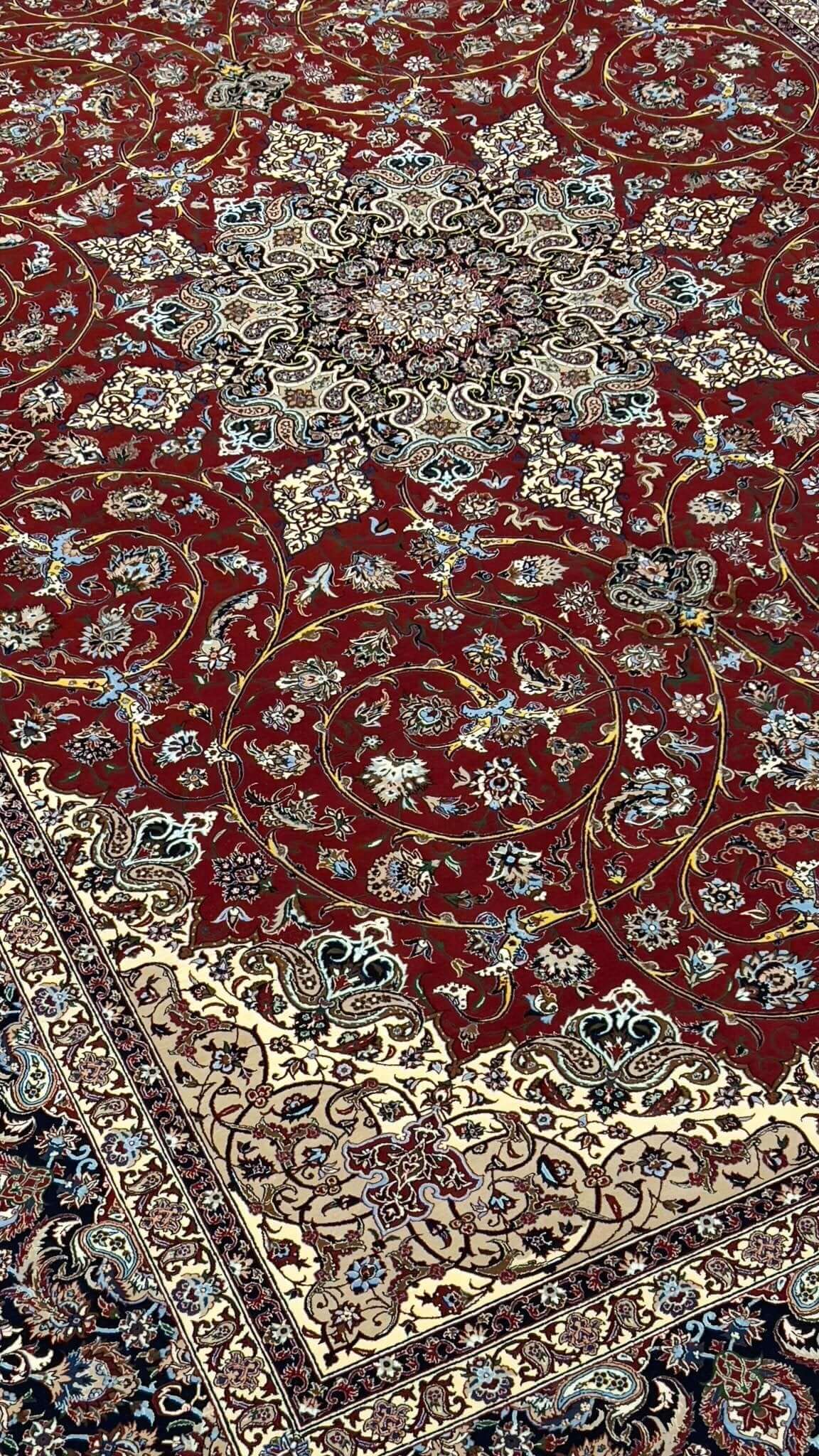 "Isfahan rug with intricate wool and silk design, handcrafted by Master Bagher Seirafian, 320 x 215 cm, featuring a 5 mm thick pile."