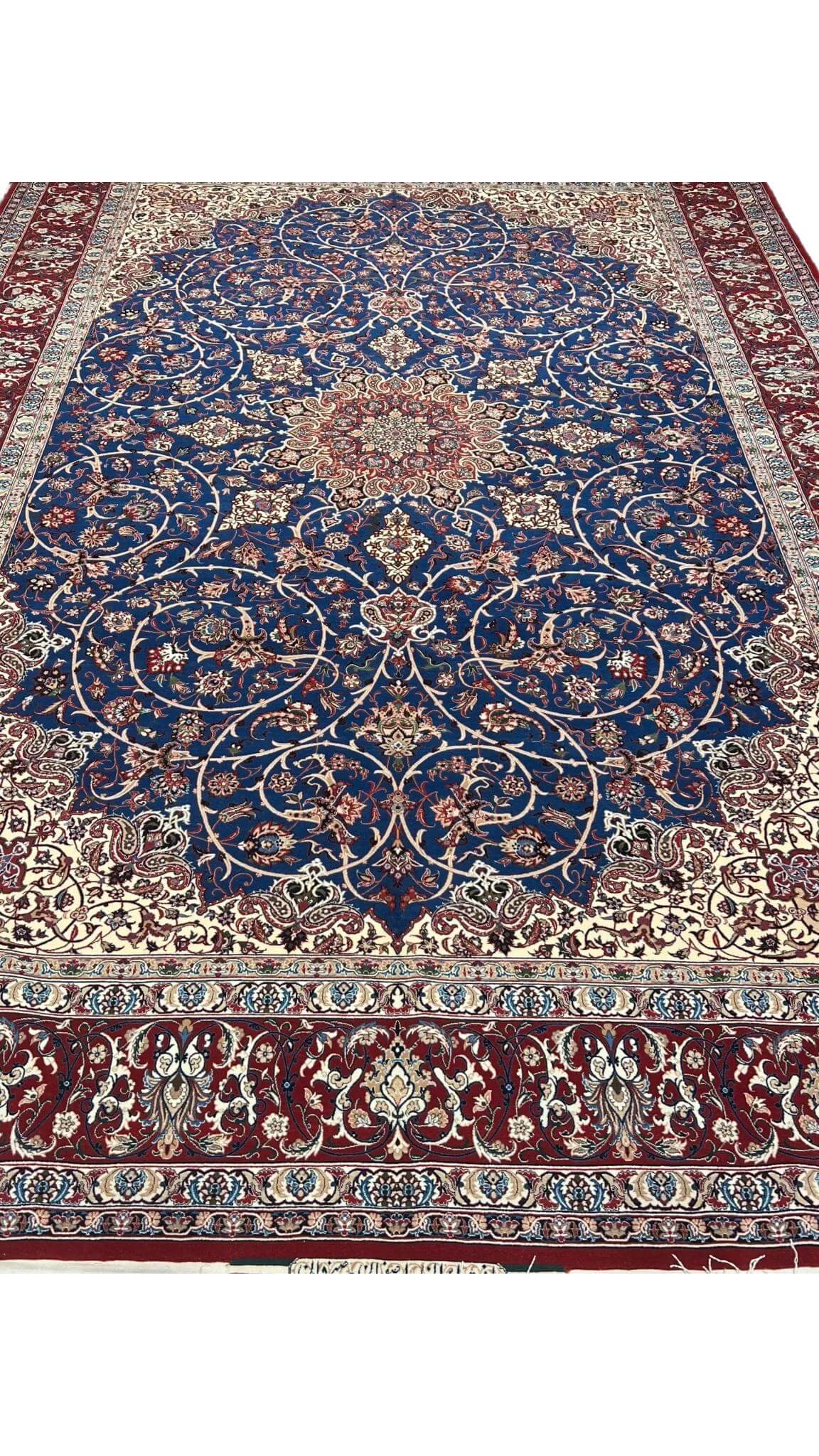 "Large Isfahan rug showcasing a sophisticated combination of traditional Persian patterns and colors."
