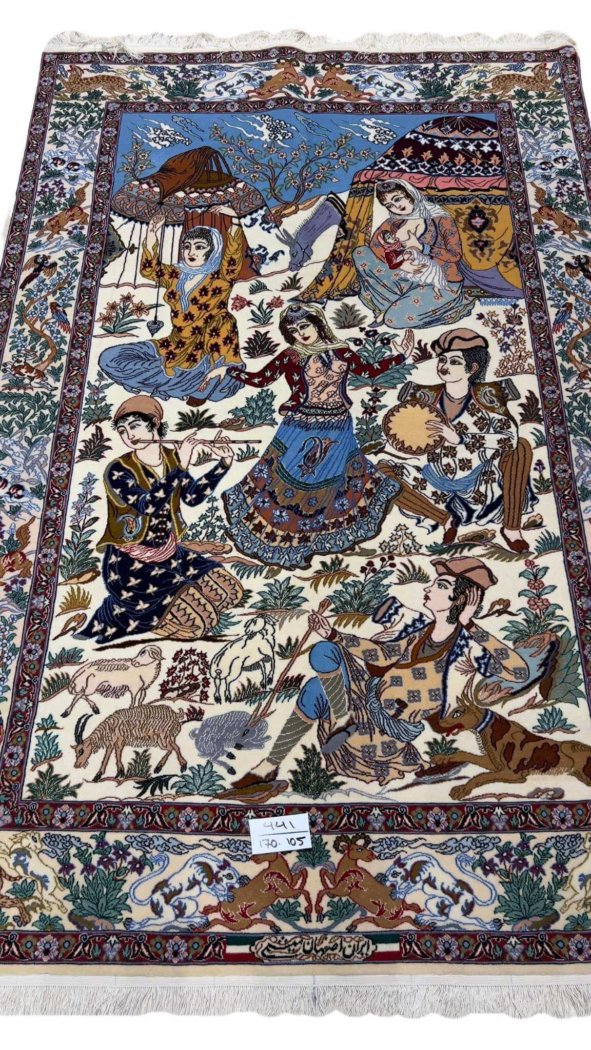 "Hand-knotted Persian wool rug from Isfahan, Iran – 175x105 cm, featuring an exquisite blend of wool and silk with a knot density of 810,000 knots per square meter, perfect for any luxury home decor."
