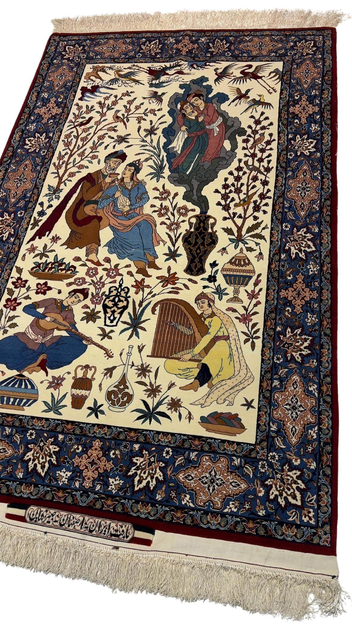 Close-up of the intricate pictorial design on a Seirafian rug, highlighting fine hand-knotted details.
