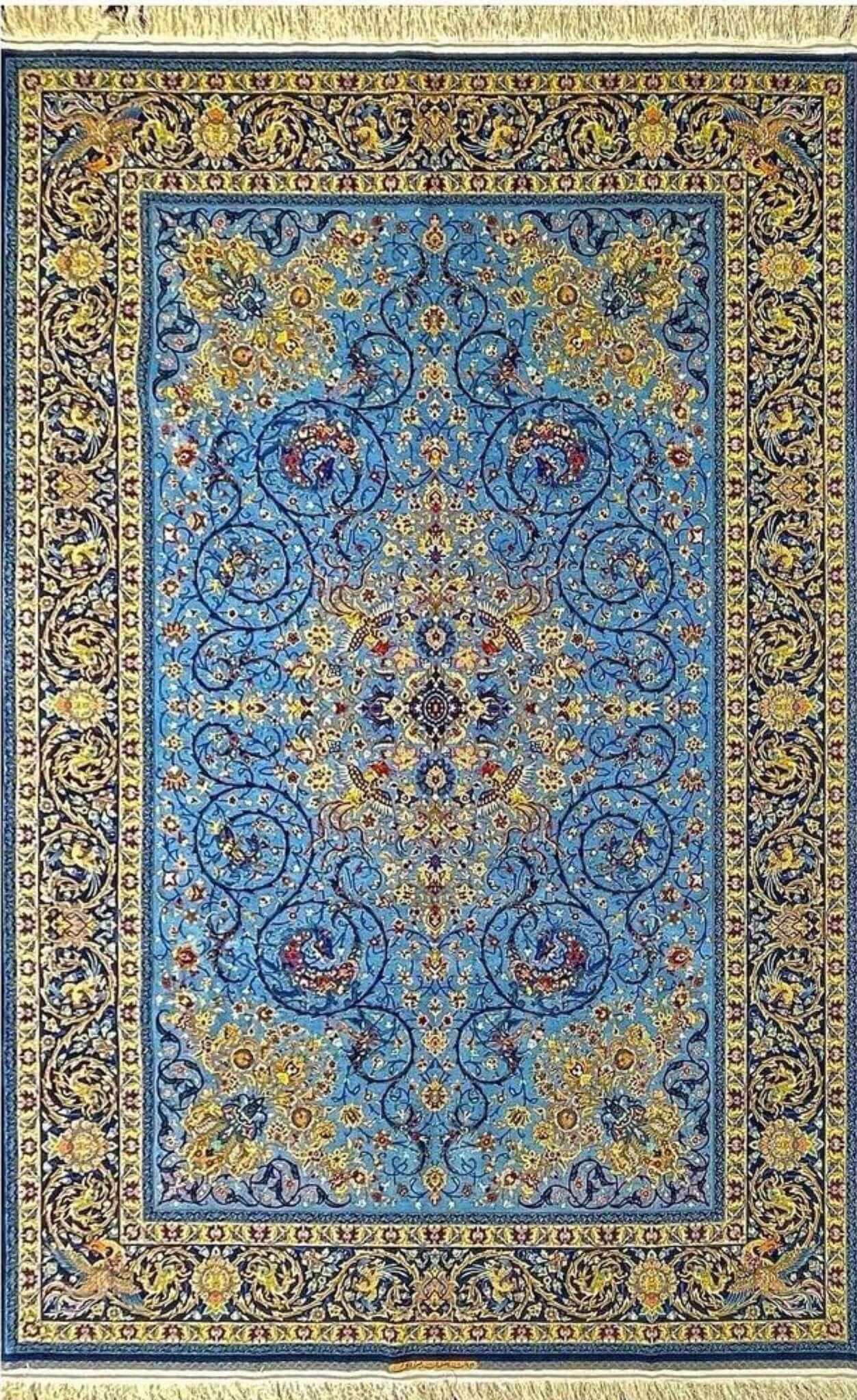 Hand-knotted blue Persian silk and wool carpet from Isfahan, Iran
