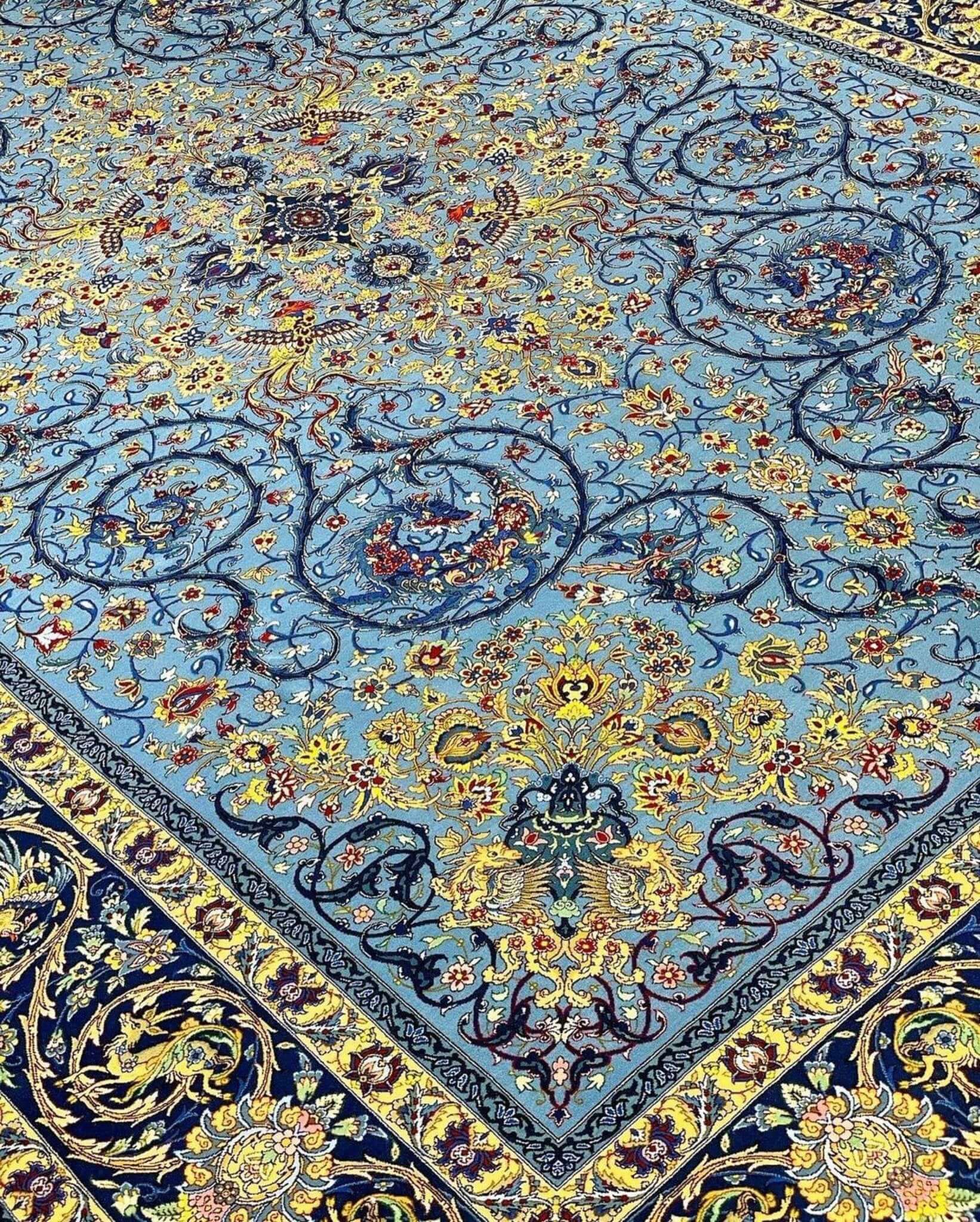 Persian blue rug with central medallion design and silk highlights