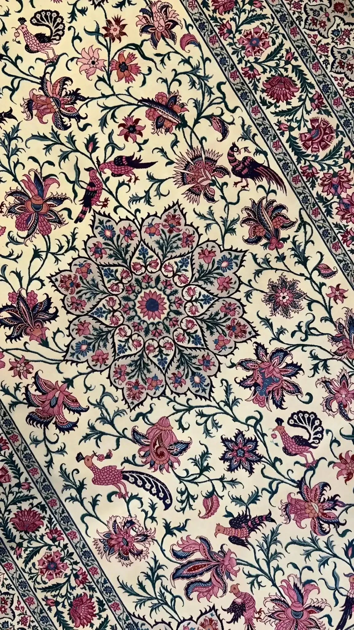 Detailed view of a Sadegh Seirafian rug showcasing intricate floral patterns