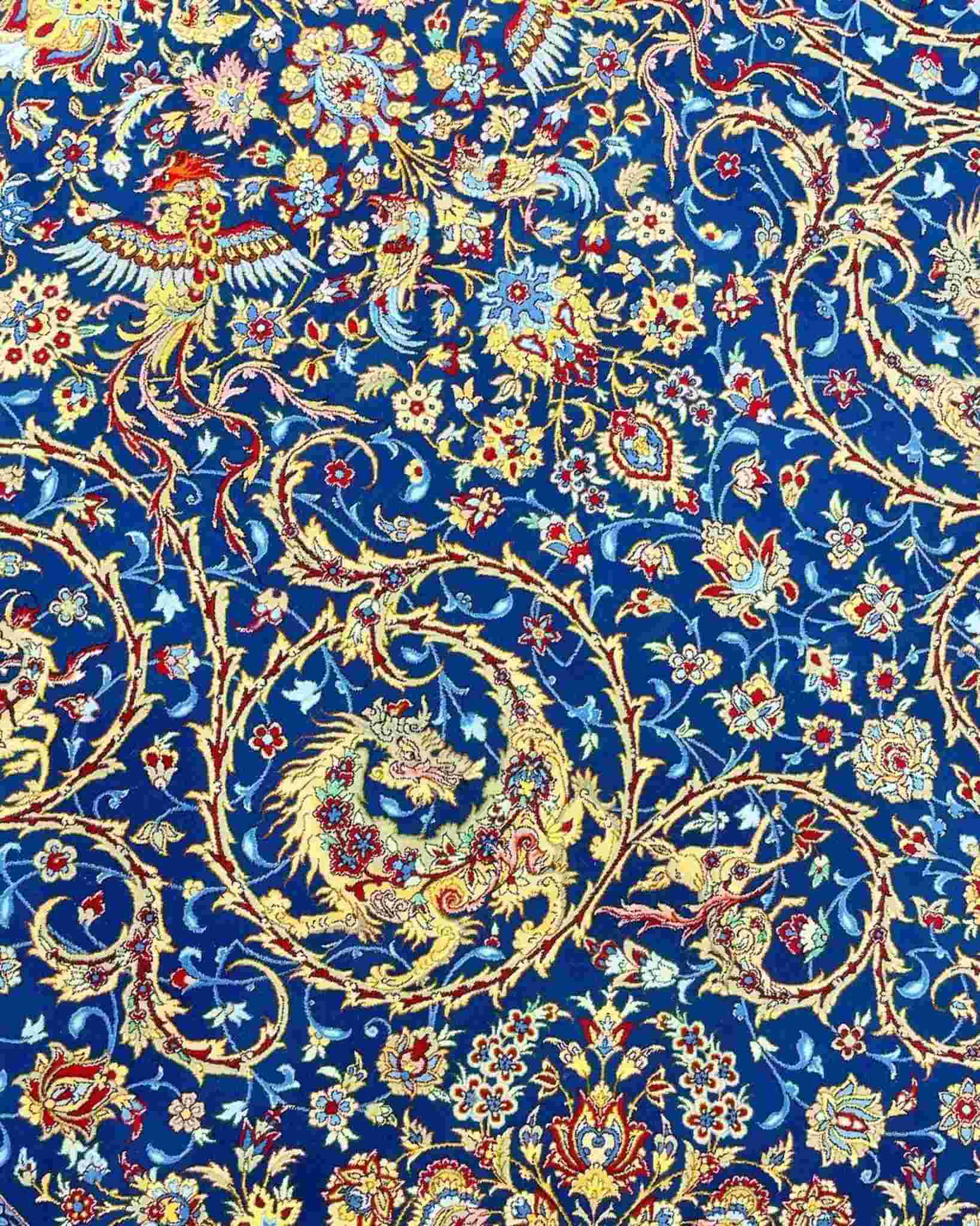 Mirzaie Hand-Knotted Rug – A luxurious wool and silk rug with a dense knot count, handmade in Isfahan, bringing artistry and comfort to your home.
