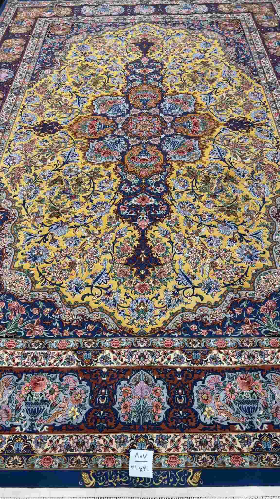 "Hand-knotted Isfahan Persian rug in vibrant floral patterns, 10.2 x 6.9 ft, by Karbasie Zadeh."