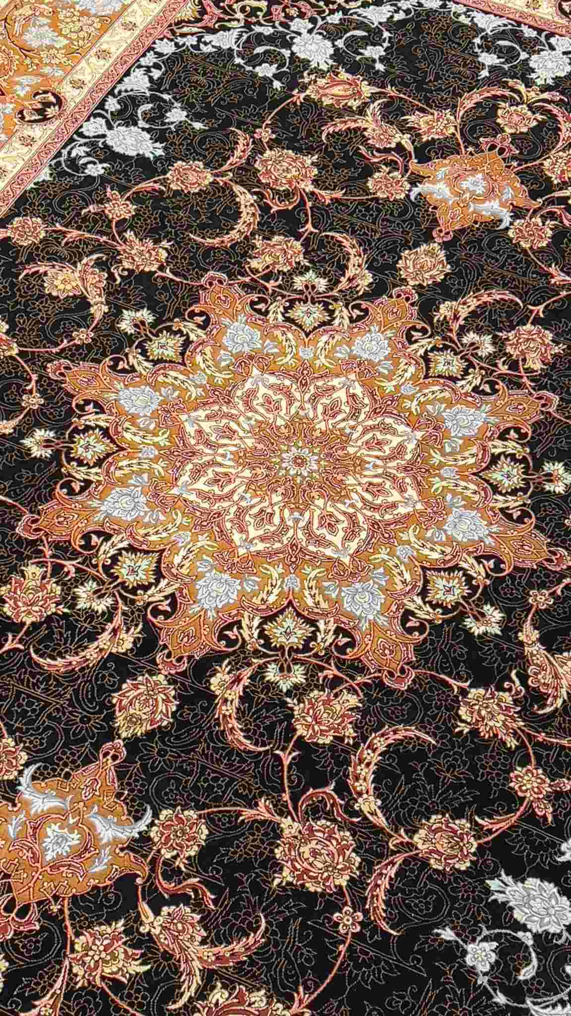 "Elegant black Persian rug with silk borders and medallion, 9.2 x 6.5 feet, showcasing fine craftsmanship."
