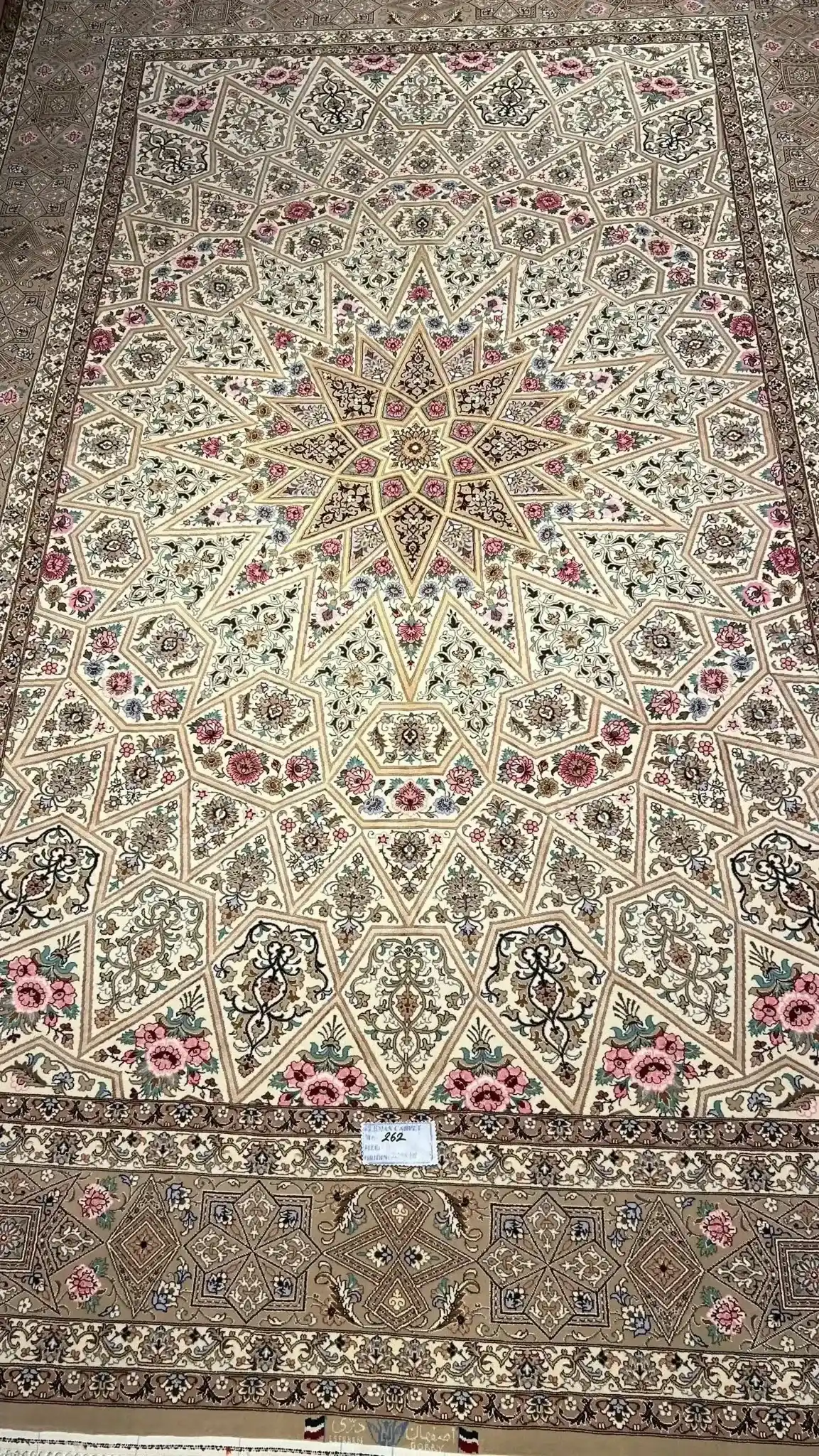 Beige Persian rug showcased in a home setting