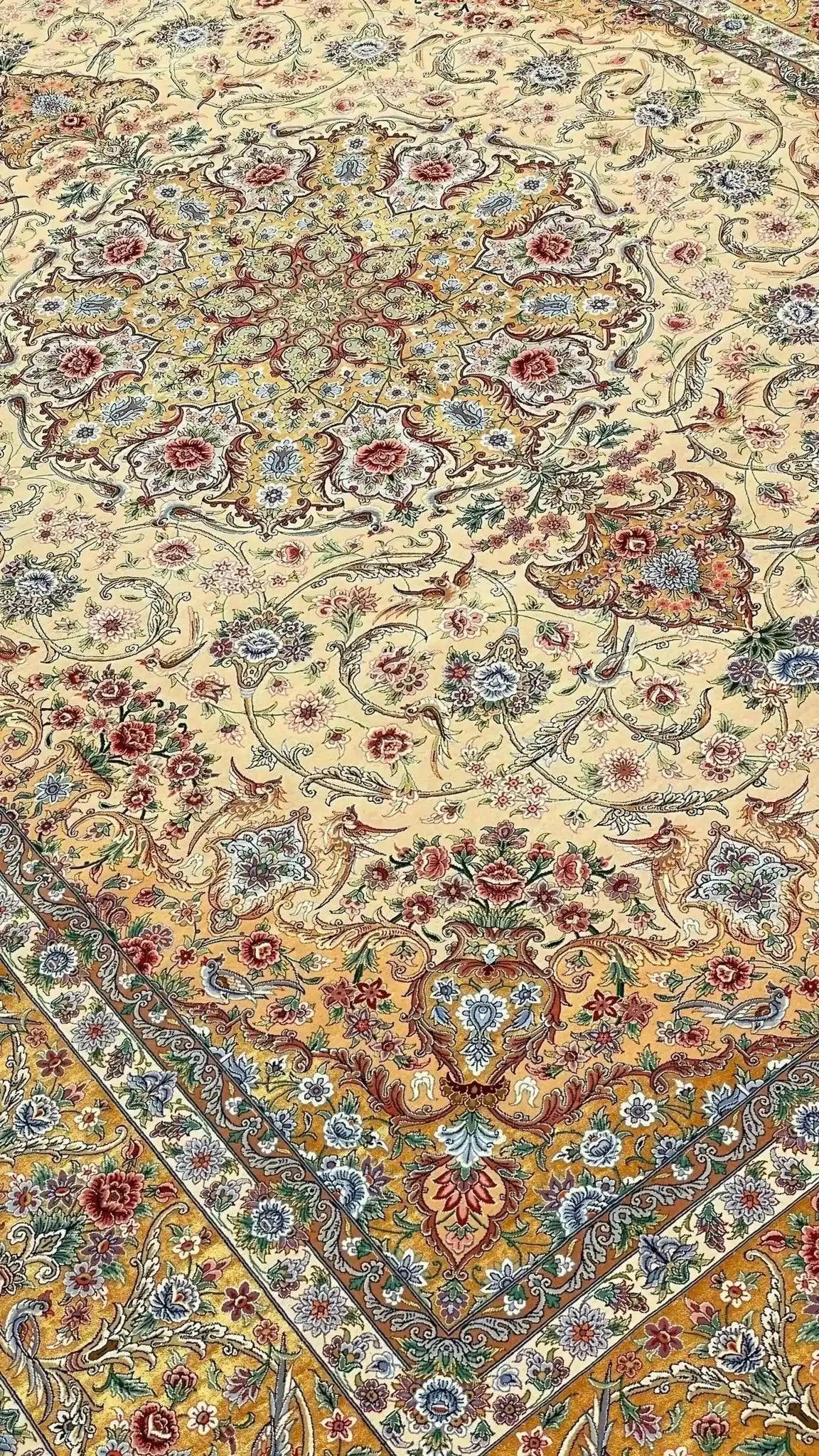 Colorful and ornate Isfahan rug with traditional design elements, size 350x250 cm