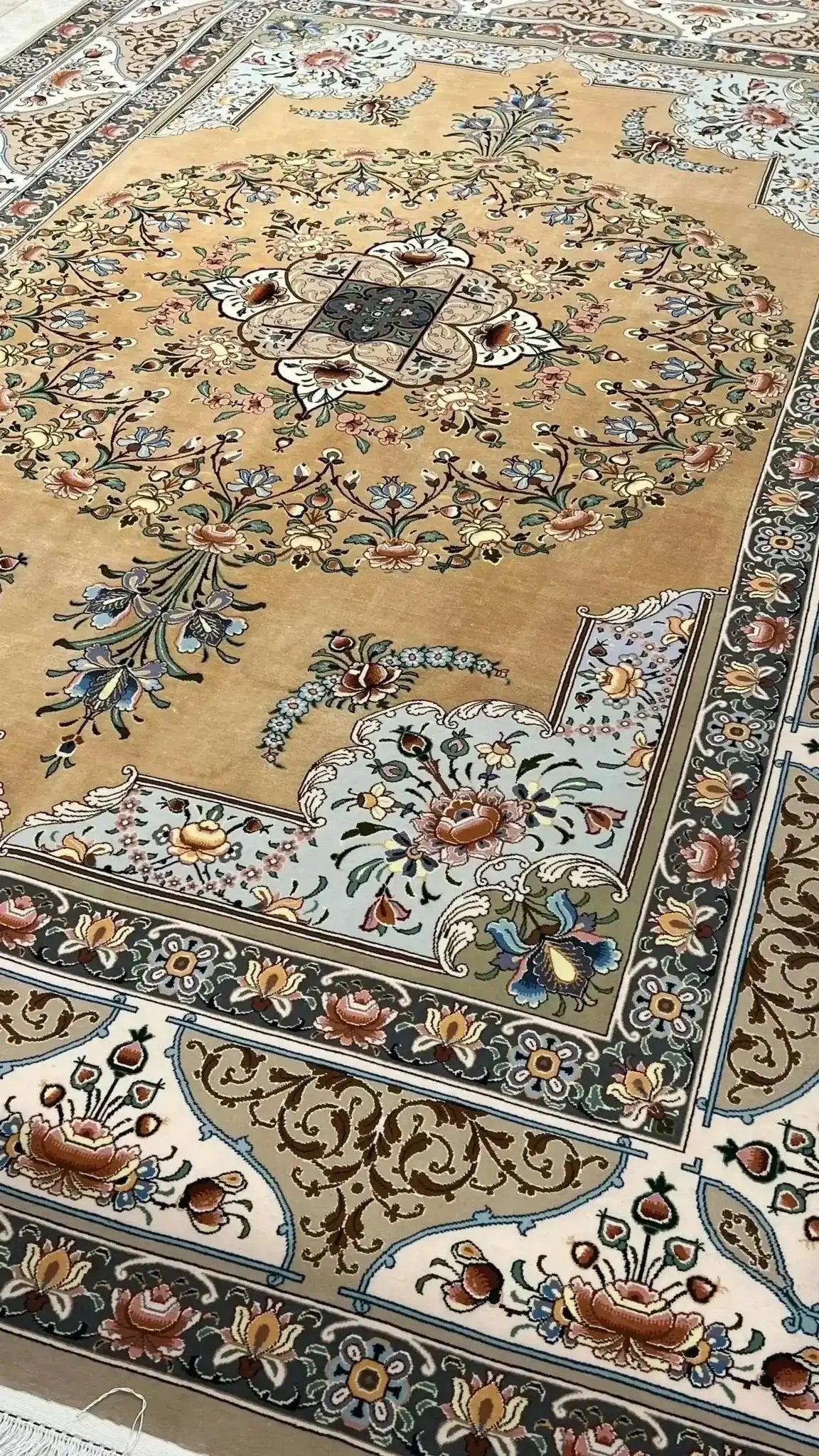 An expansive Isfahan rug showcasing intricate floral patterns and traditional craftsmanship