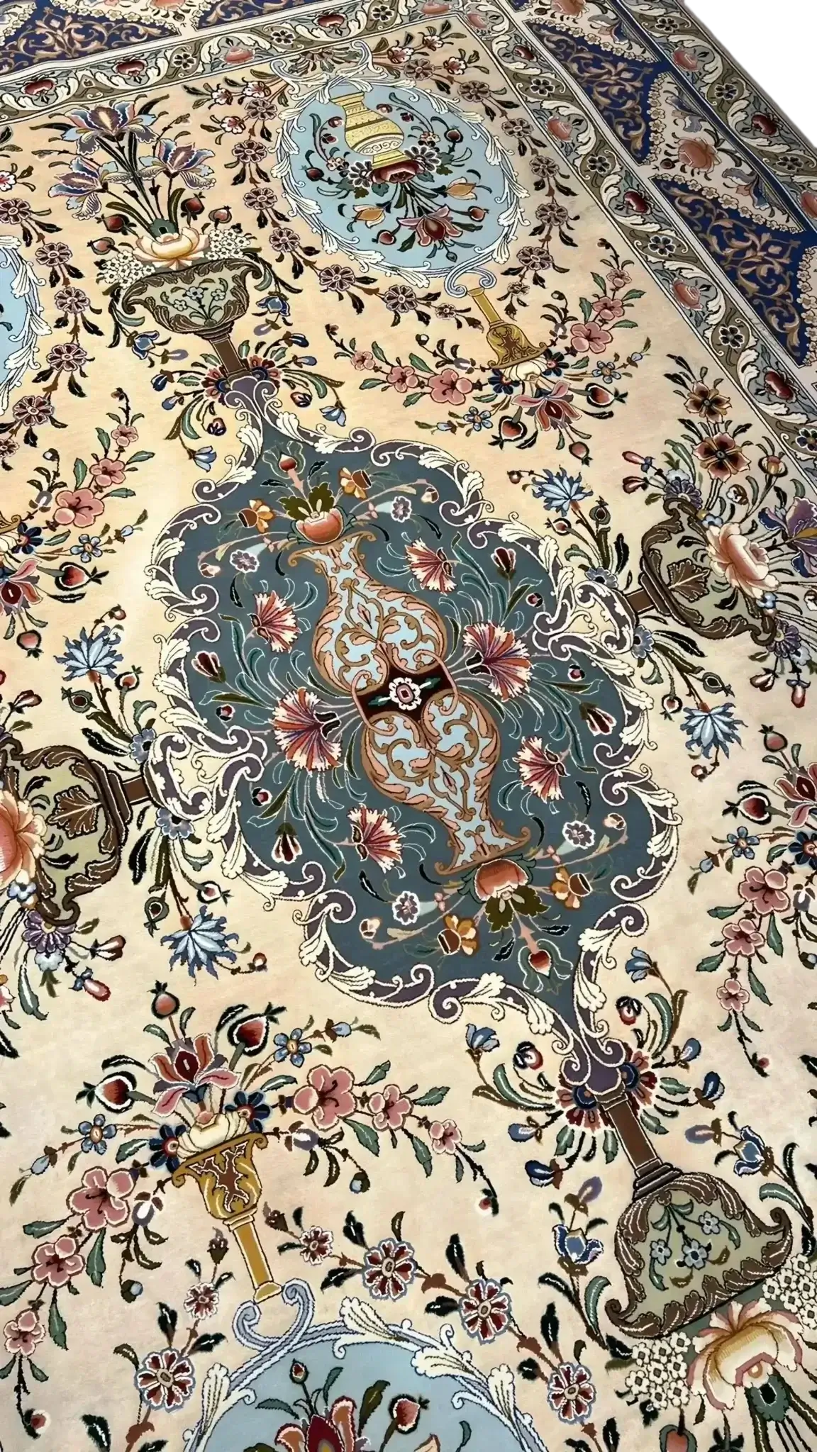 Handcrafted silk rug from Iran featuring intricate floral patterns