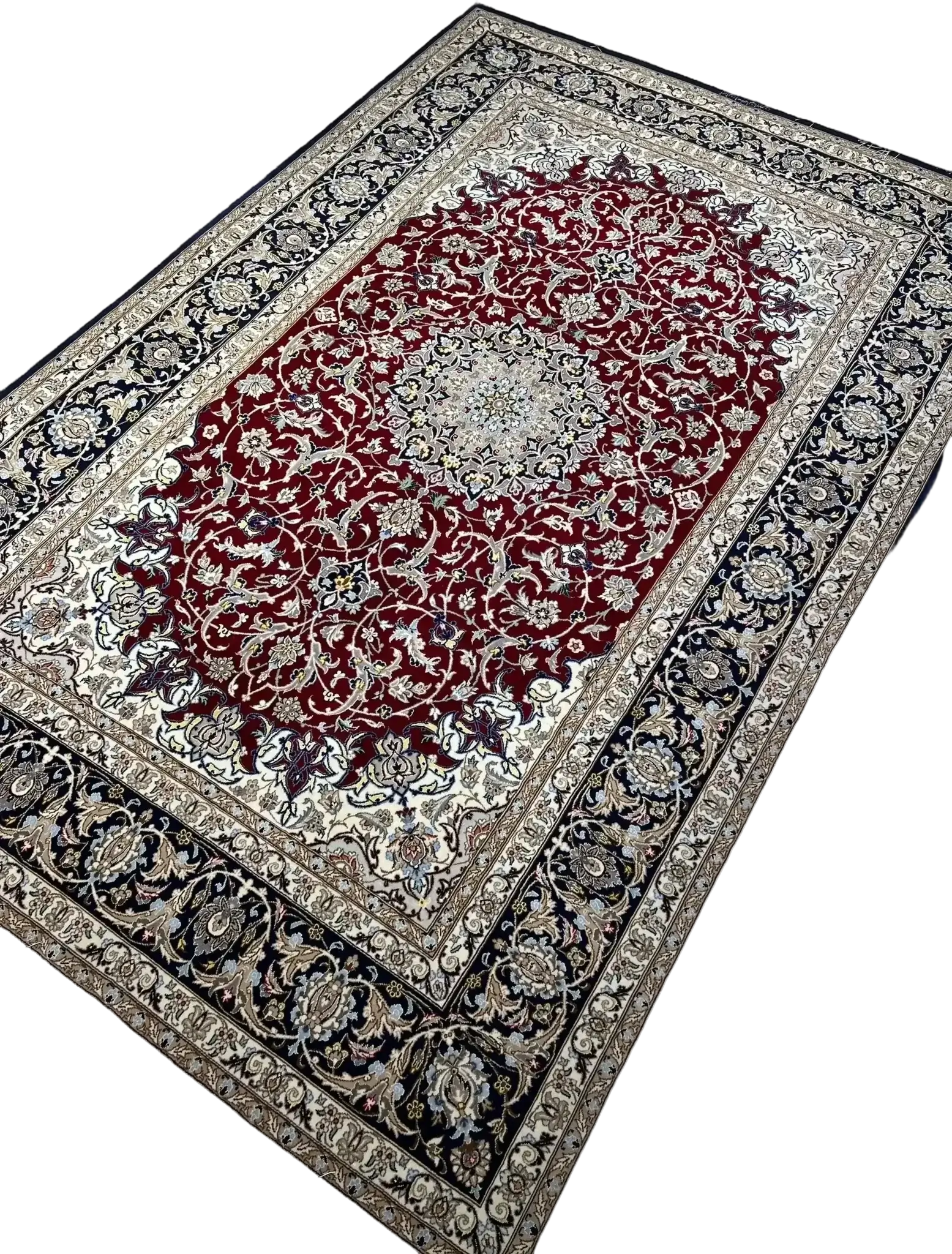 An Isfahan Persian rug featuring red and blue patterns and detailed motifs