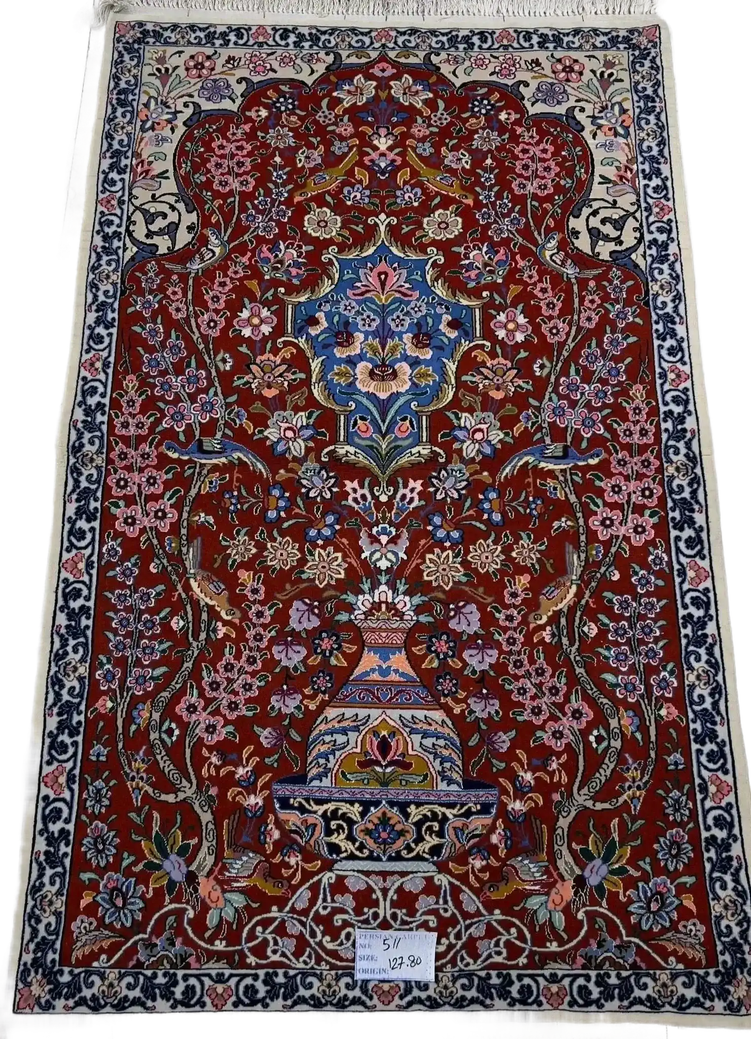 Handmade traditional carpet in red with floral motifs, 127x80 cm
