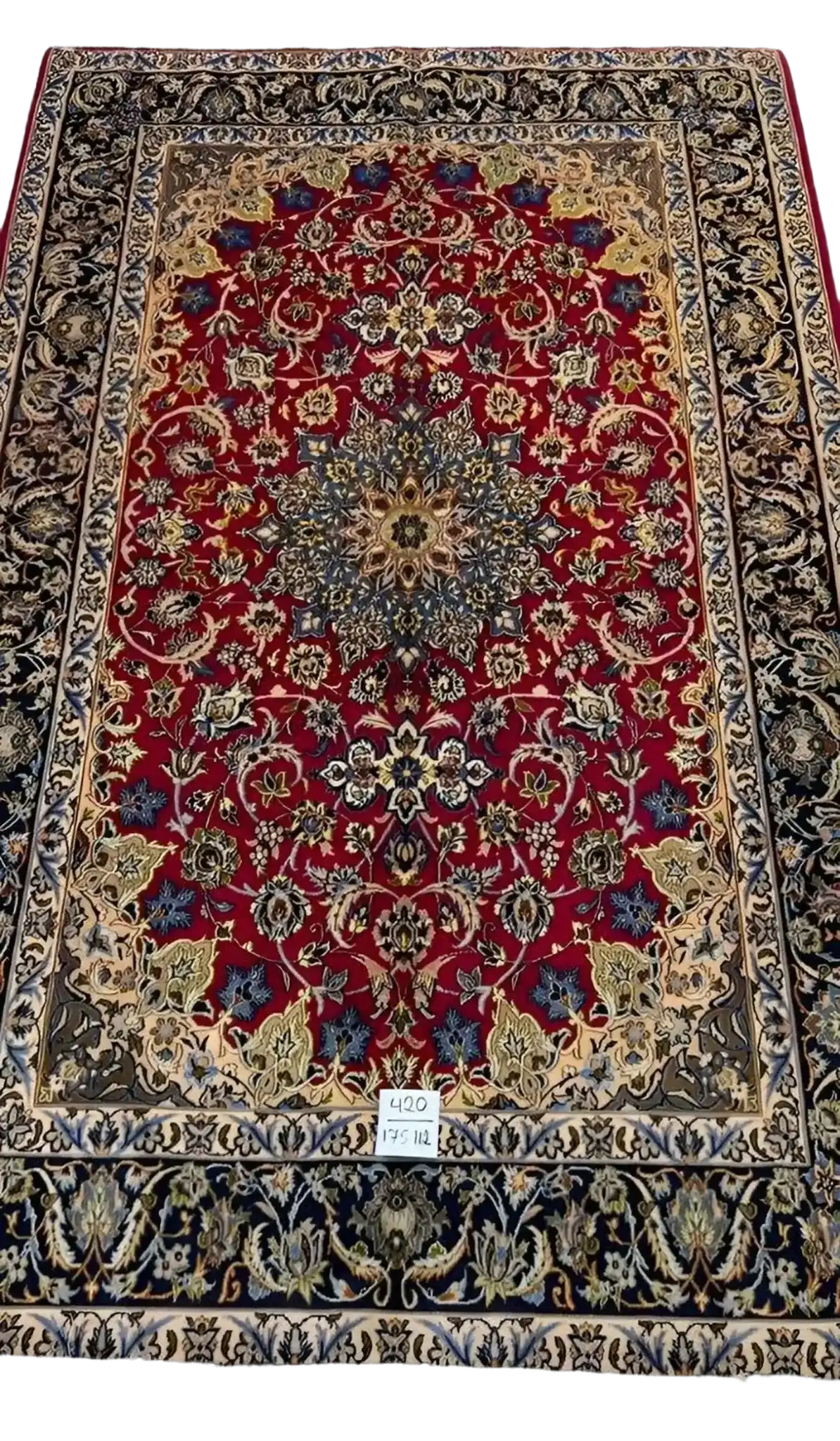"Hand-knotted Persian rug for sale, featuring intricate wool and silk craftsmanship in deep, rich colors. Oriental area rug from Isfahan, Iran, measuring 175 cm x 112 cm."

