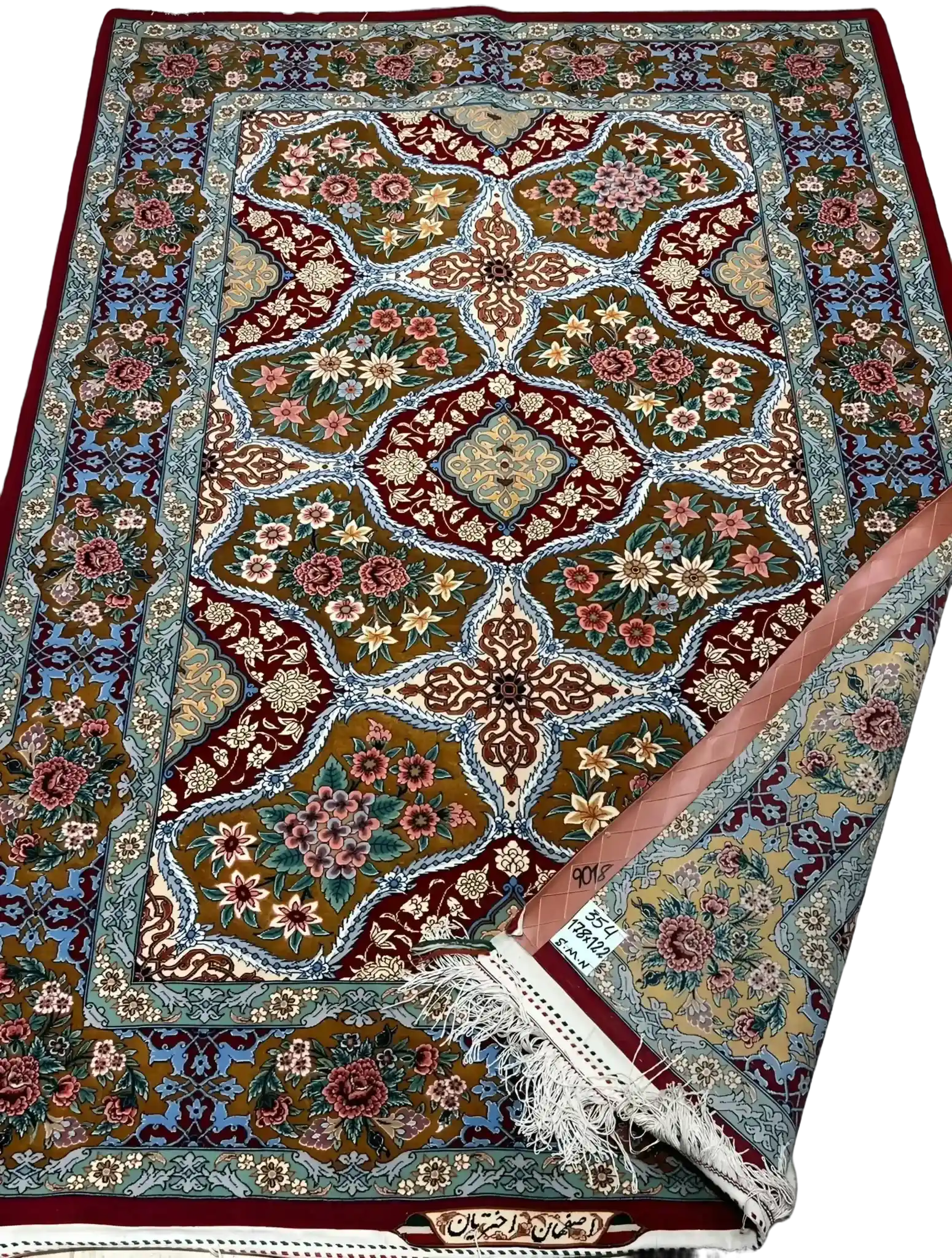 Close-up of the vibrant patterns on the Akhtarian Silk Rug