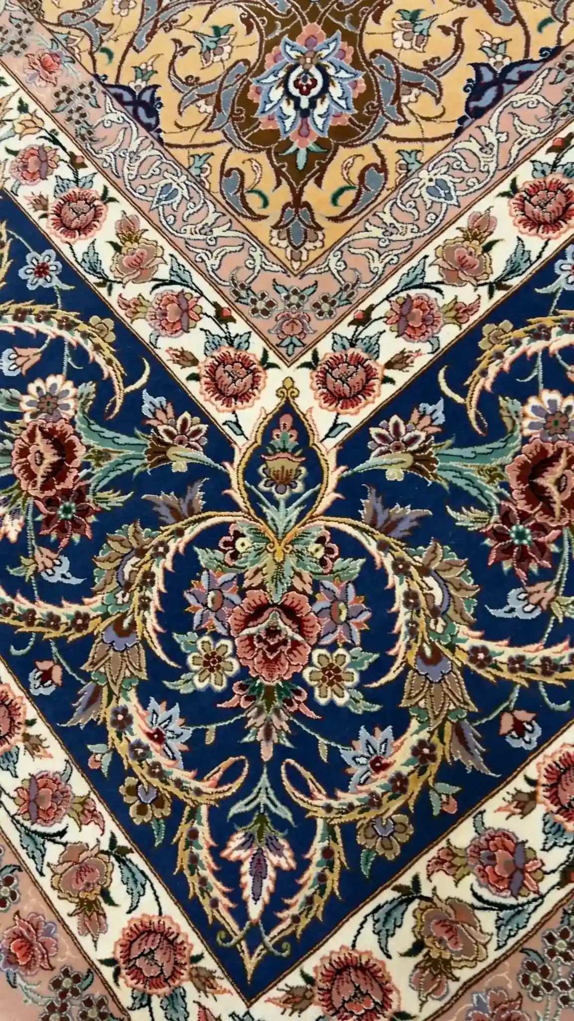 "Hand-knotted Isfahan Sheikh Bahaie rug in blue and gold floral design, 350x250 cm, silk and wool blend."